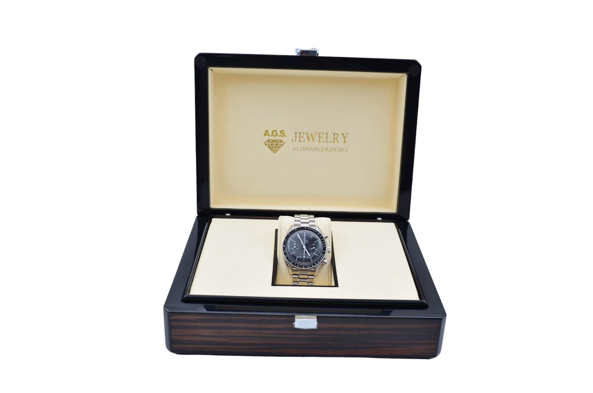 The watch is in a very good condition, it has professional polish and it’s working well. The total length of the bracelet (case+bracelet) is 18.5cm. The watch comes with an AGS Jewelry wooden box, along with an AGS Jewelry warranty card. For more