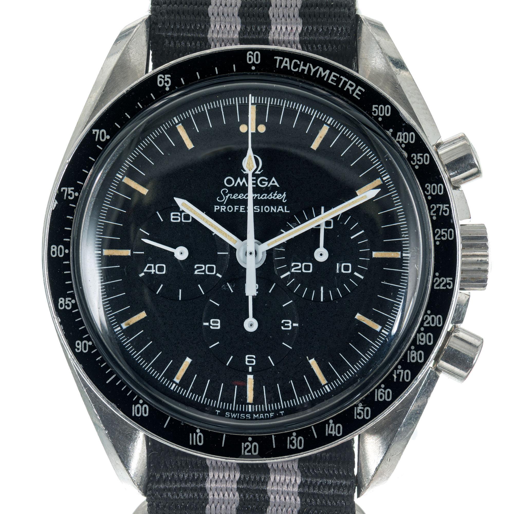 1960's Omega Speedmaster 145022-69 ST. Circa 1969 Natural patina on case. Stainless steel Nato style black and grey band. 

Length: 48.07mm
Width: 20mm
Band width at case: 20mm
Case thickness: 14.56mm
Band: Nato
Crystal: Acrylic
Dial: Black