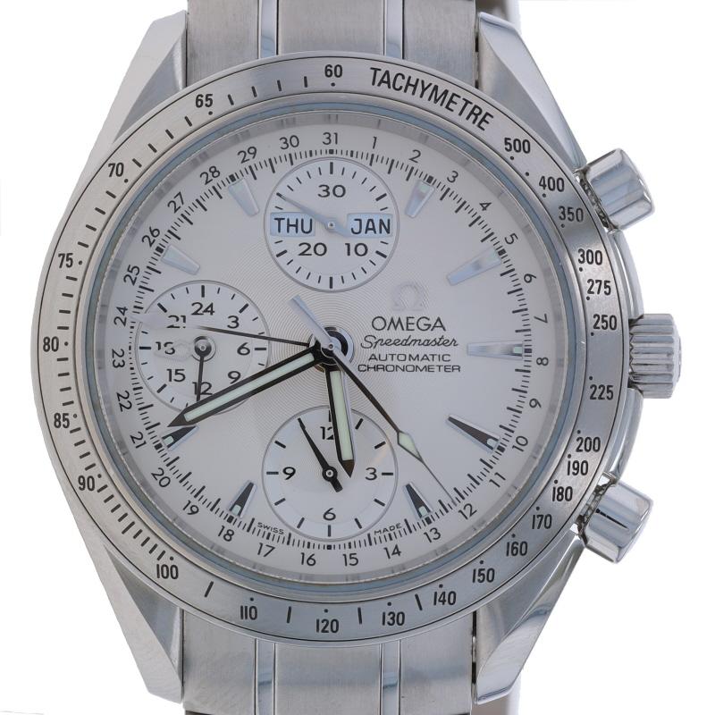 Brand: Omega
Model: Speedmaster Day-Date
Model Number: 3221.30.00
Movement: Automatic
Warranty: One Year
Movement Maker: Swiss
Dial Color: White

Metal Content: Stainless Steel

Fastening Type: Deployment Clasp
Features: 
Seconds sub dial 
12 hour