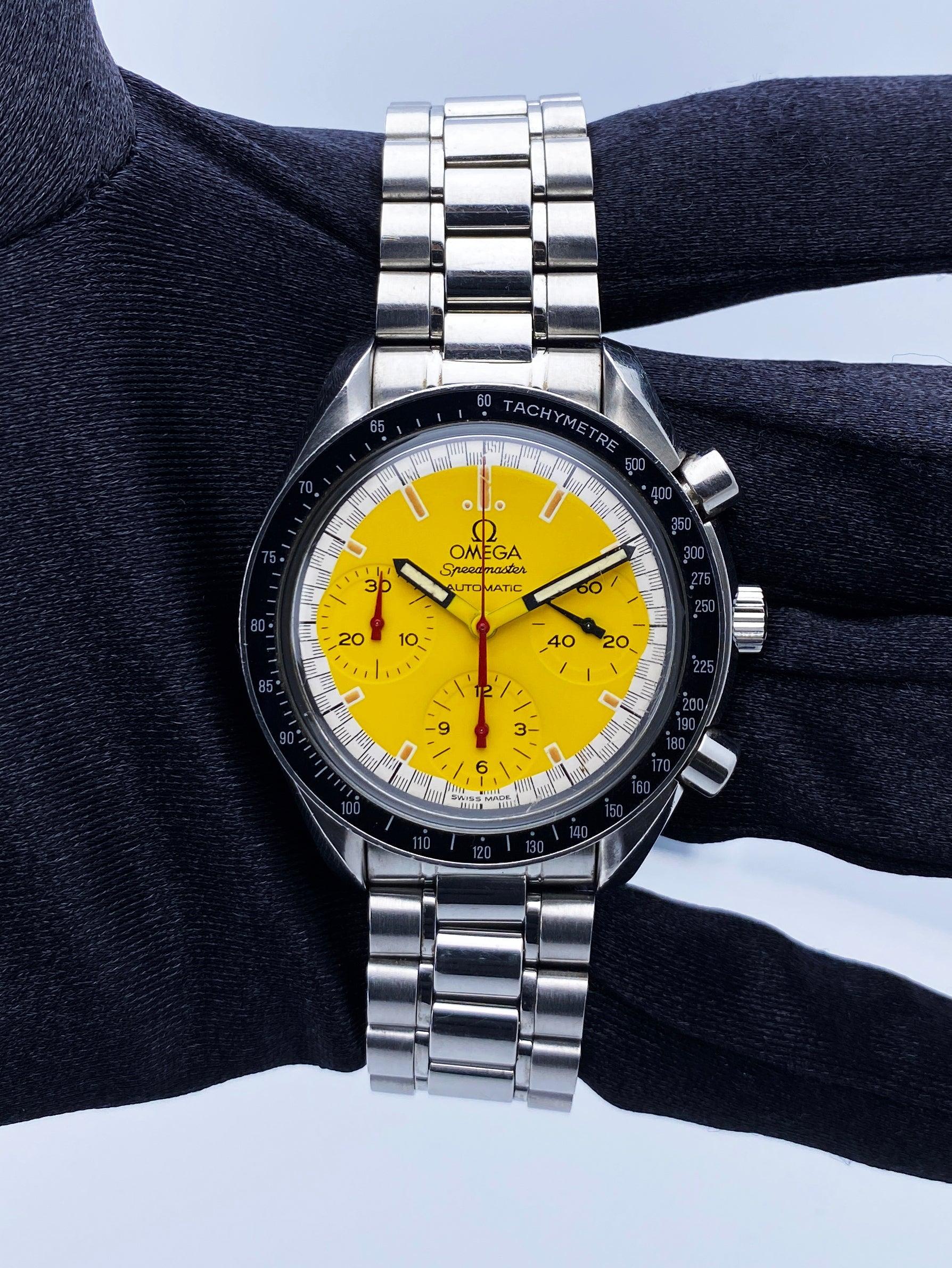 Omega Speedmaster Michael Schumacher 3510.12.00 Mens Watch. 39mm stainless steel case. Stainless steel tachymeter bezel with black insert. Yellow dial with luminous hands and index hour markers. Three sub-dials. Small seconds hand at 3 o'clock.