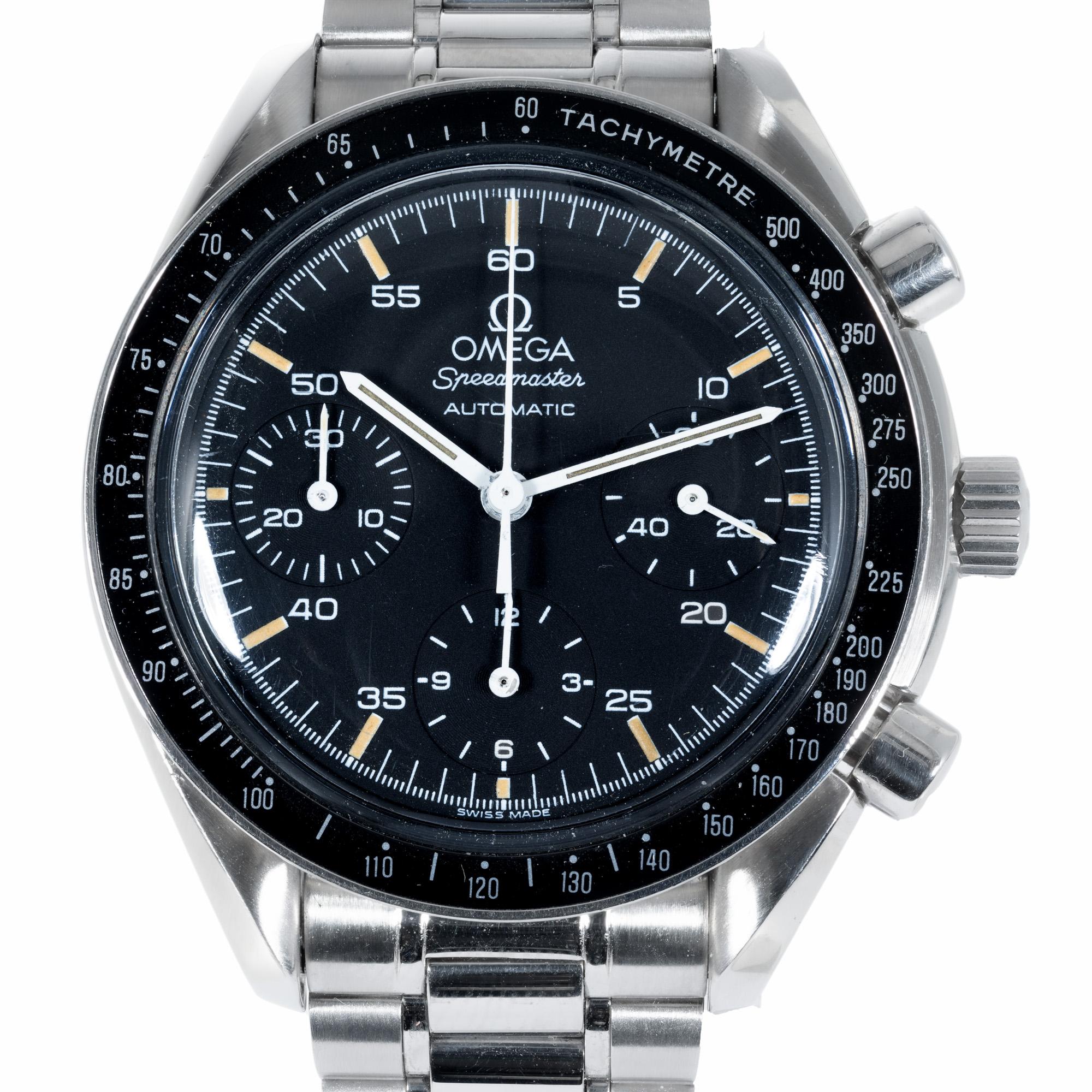 Excellent mens 1141 Omega speedmaster Hesalite chronograph. Warranty card. No box. Circa 1996-1997.  39mm diameter. Automatic self-winding chronograph movement. Stainless steel bezel with black dial and tachymeter function. Three chronograph