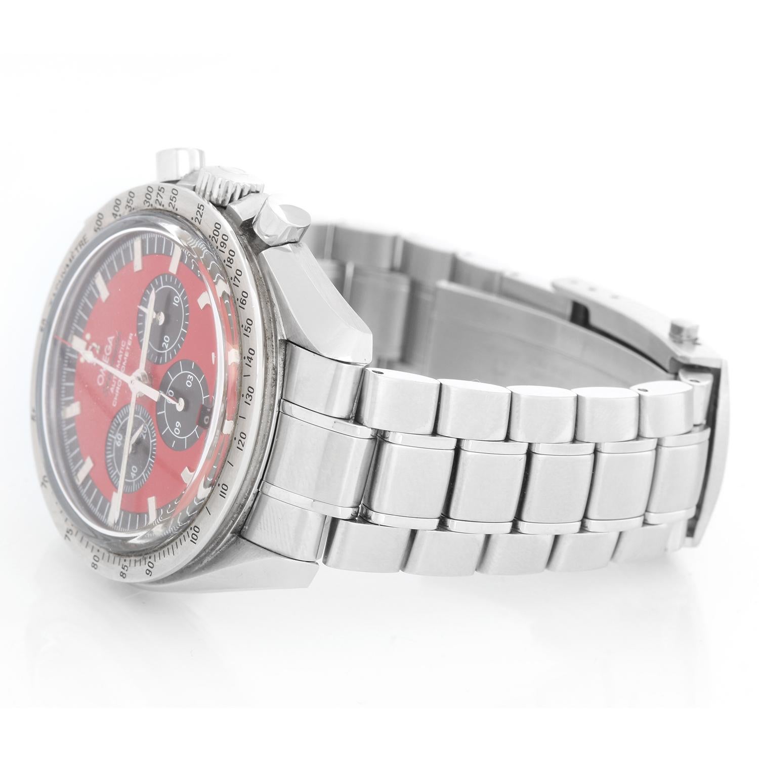 Omega Speedmaster Schumacher Stainless Steel  Chronograph 3506.61.00 - Automatic winding. Stainless steel case (38mm diameter). Red dial with hour, minutes and seconds recorders. stainless steel Omega bracelet; will fit up to a 7 1/2 inch wrist .