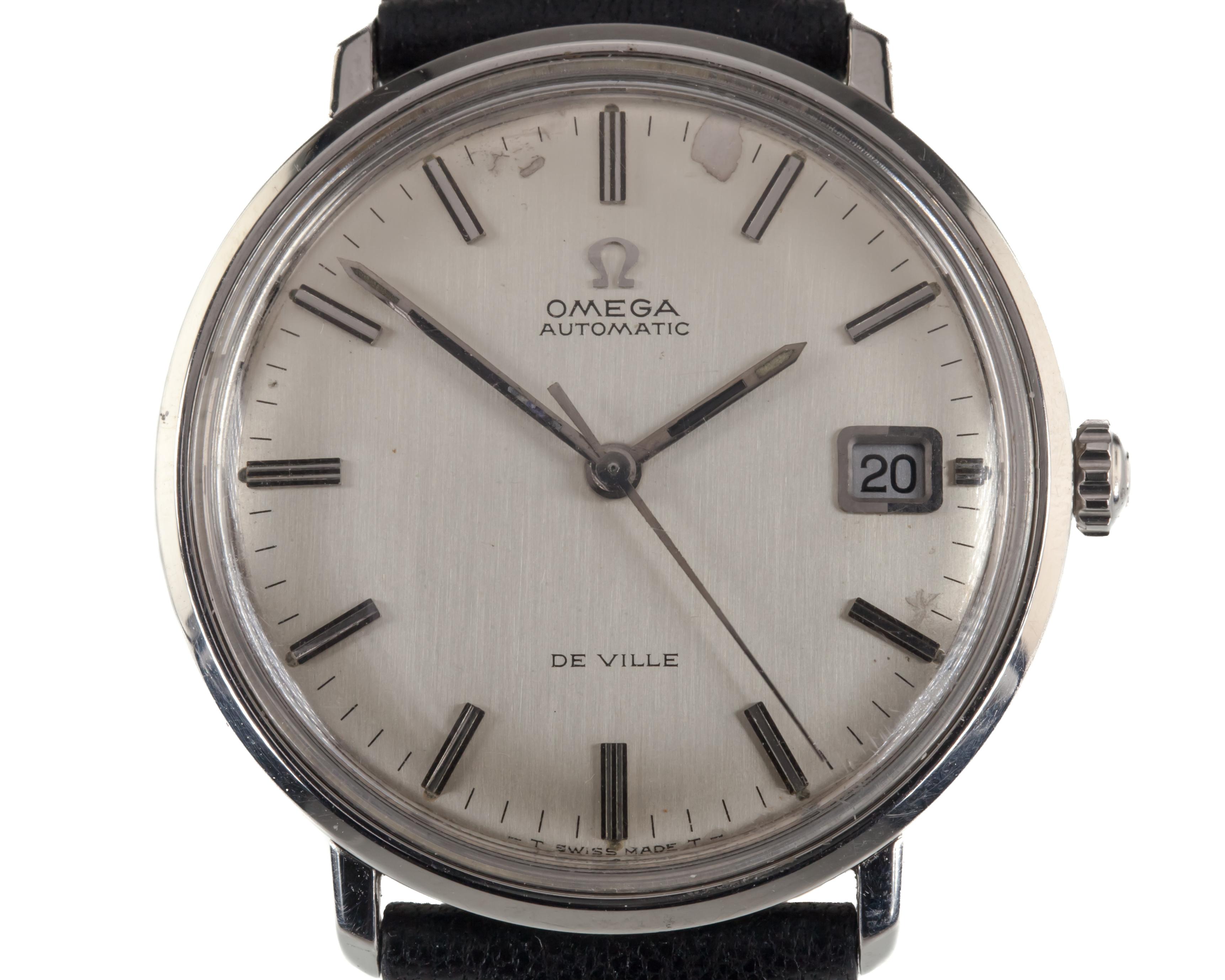 Omega Stainless Steel Men's Automatic DeVille Watch w/ Date and Leather Band

Movement #565
Movement Serial #307684XX
Year: 1969
Case #166.033

Stainless Steel Round Case
34 mm in Diameter (36 mm w/ Crown)
Lug-to-Lug Distance = 32 mm
Lug-to-Lug