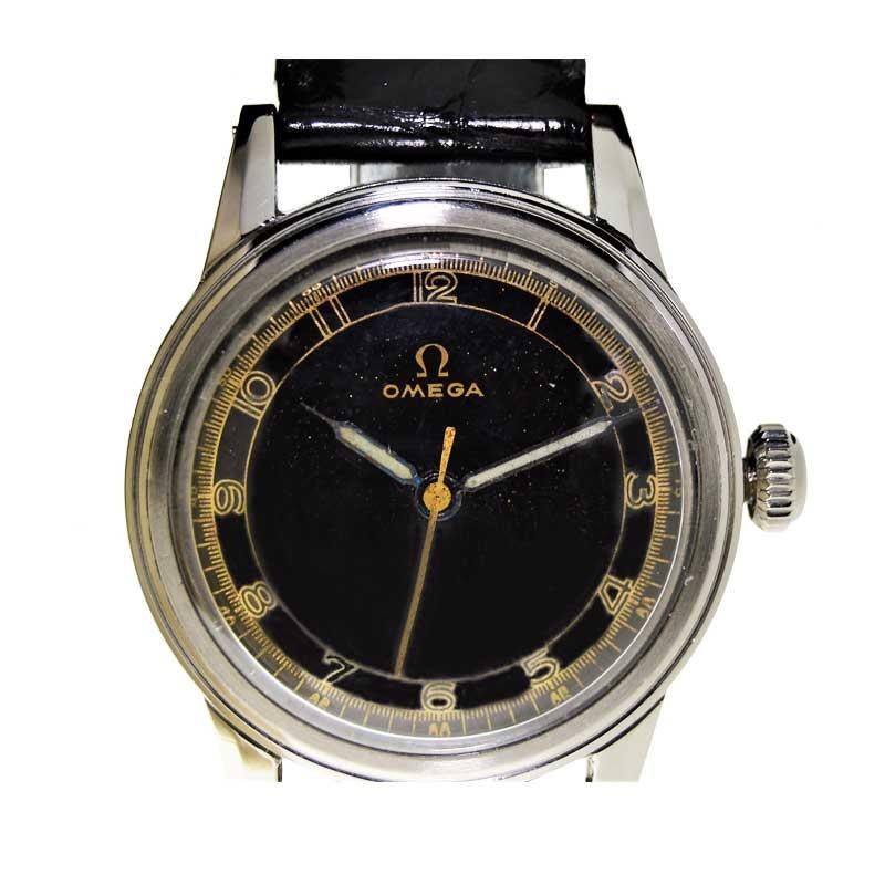 Women's or Men's Omega Steel Art Deco Round Watch with Rare Original Black Dial, circa 1930s