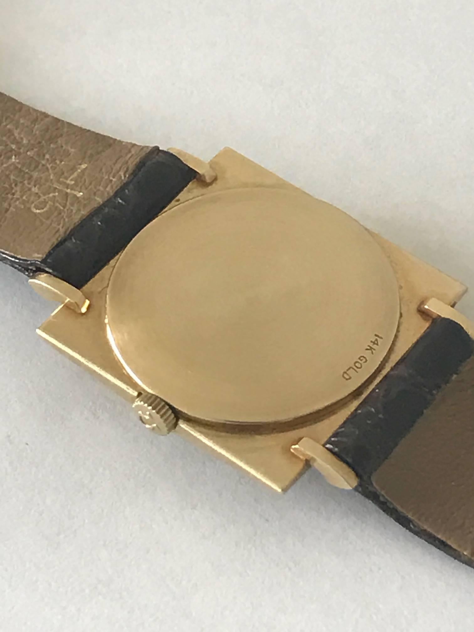 Modern Omega Textured Gold Dress Watch