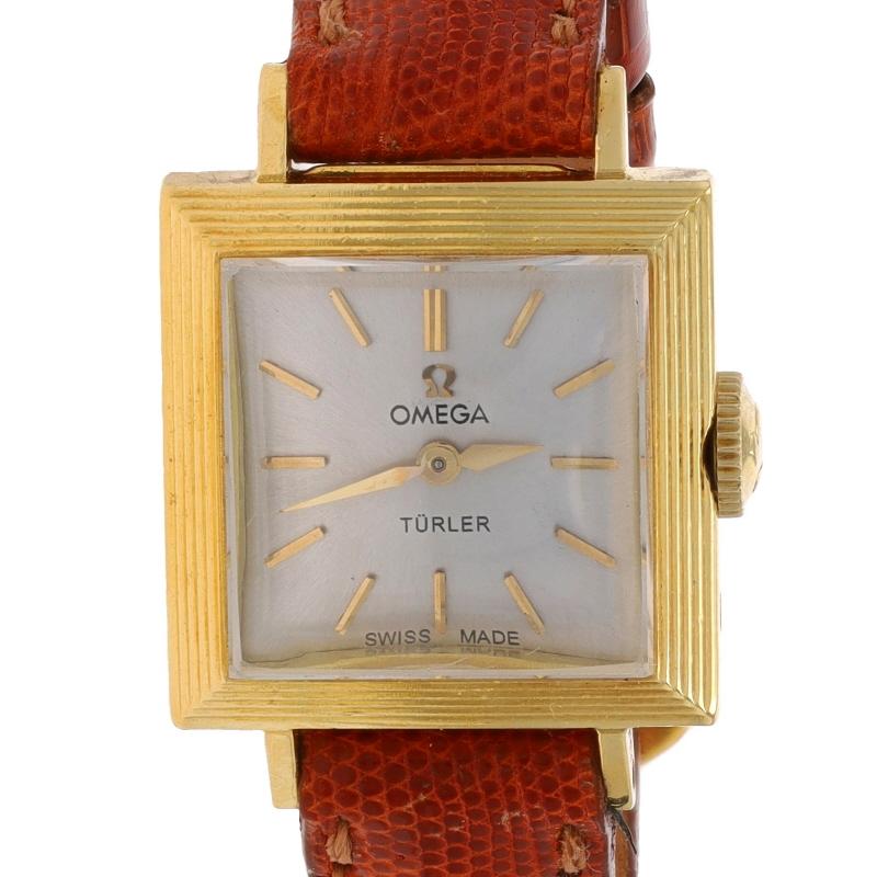 Marke: Omega
Modell: Turler
Uhrwerk: Mechanisch
Anzahl der Juwelen: 17
Garantie: Ein Jahr
Jahr: 1959
Uhrwerk-Hersteller: Schweiz
Zifferblattfarbe: Creme

Metallgehalt: 18k Gelbgold

MATERIAL Informationen
Echte Teju-Eidechse
Farbe: