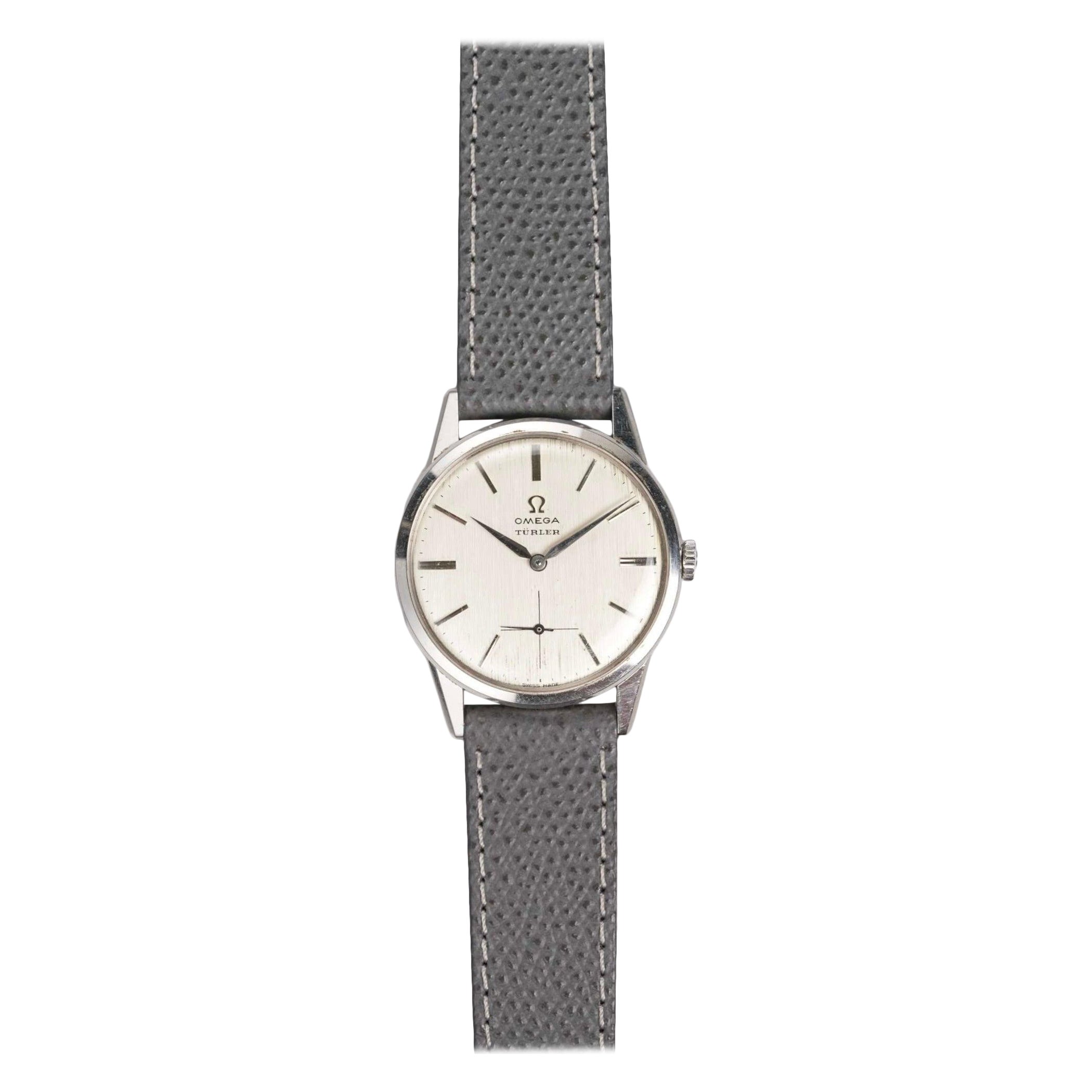 Reloj Omega Turler de acero, años 60 en venta