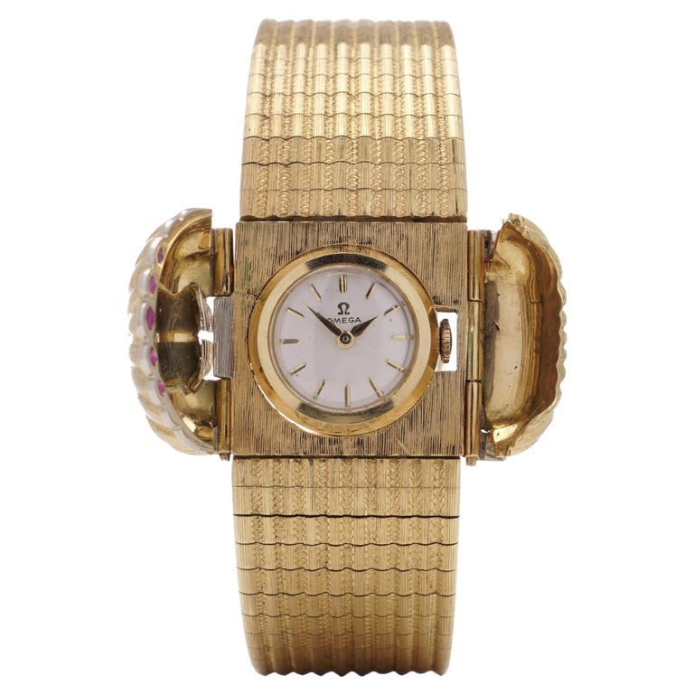 Omega vintage Montre-bracelet pour femme en or jaune 18 carats, années 1950  En vente sur 1stDibs