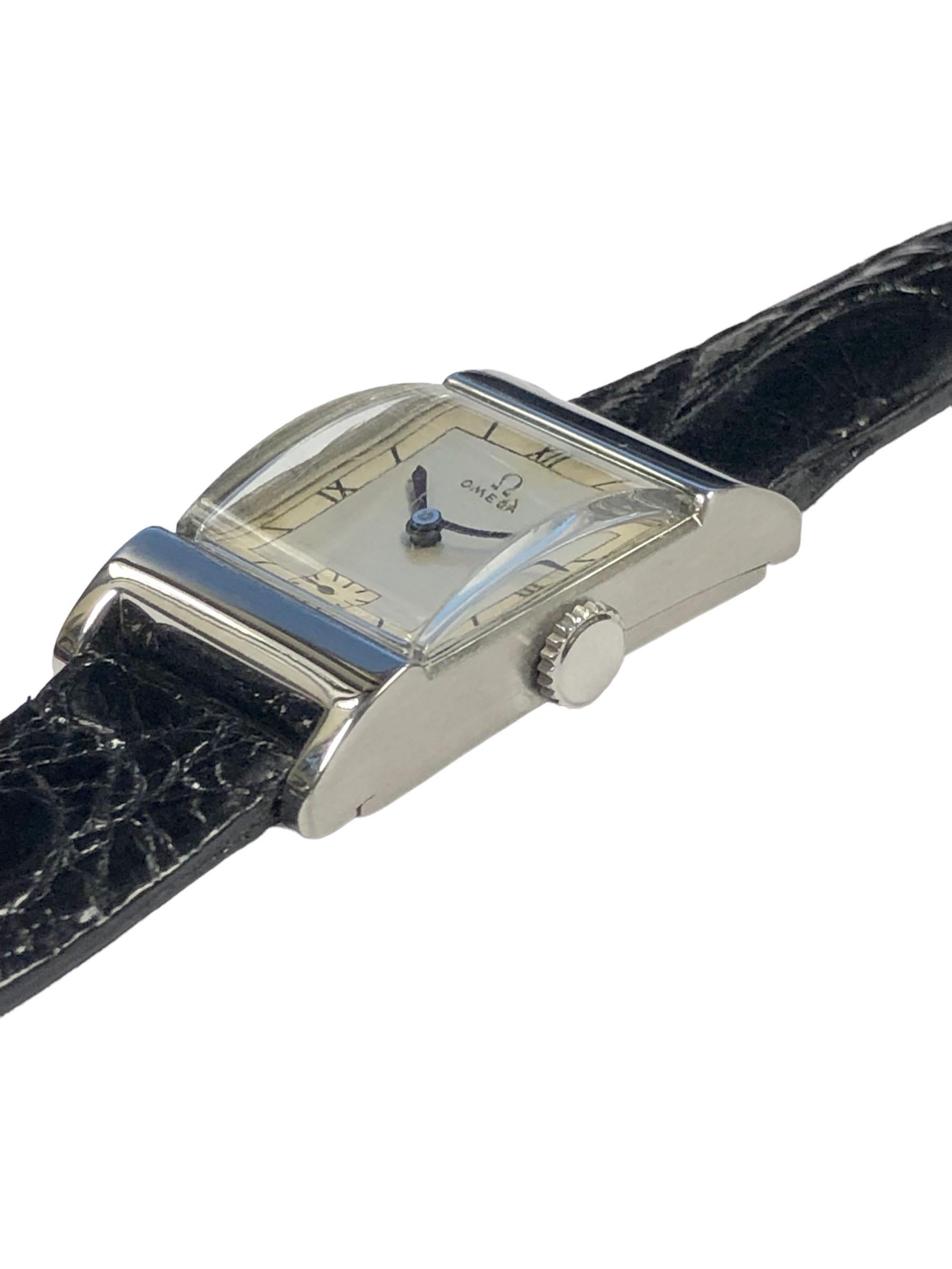Circa Late 1930s Omega Wrist watch, 36 X 20 M.M. 2 Piece Stainless Steel signed Omega case, 17 Jewel Mechanical, Manual Wind Nickle Lever Movement, original near mint 2 tone Silver Satin Dial. Original Thick Curved Glass Crystal, New Black Alligator