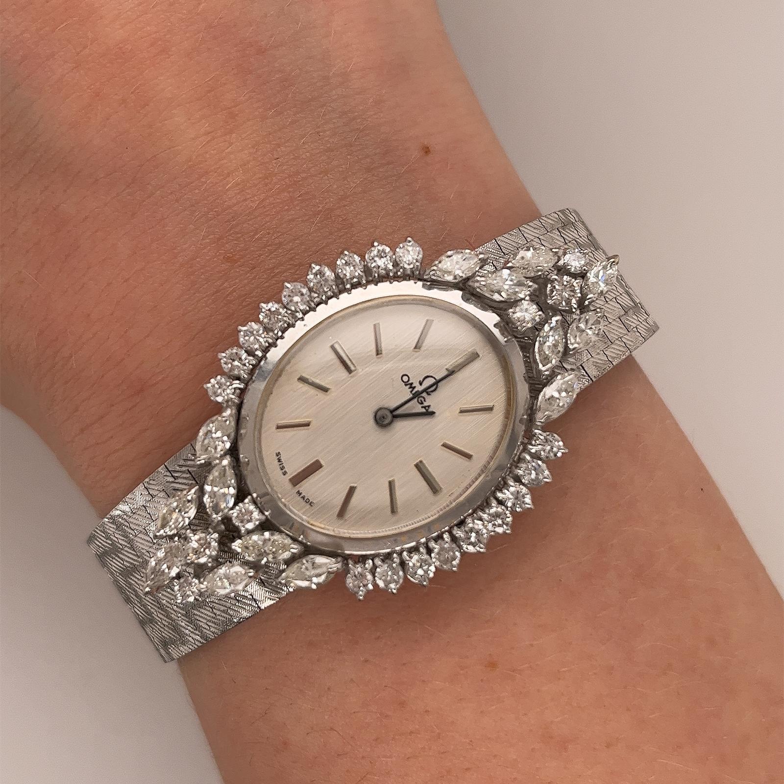 Experience timeless elegance with this OMEGA Diamond 18ct White Gold Vintage Watch from the 1970's set with 1.60ct marquise shape diamonds and 1.0ct round brilliant cut natural diamonds.

This exquisite timepiece is a perfect blend of classic design
