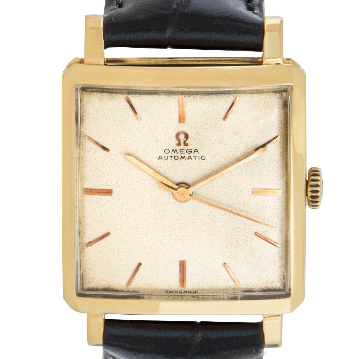 A vintage Omega wristwatch crafted in yellow gold. Featuring a silver dial with applied hour markers which is encased with a plastic glass. This piece is presented on a black generic leather strap and a generic pin buckle.

In excellent condition,
