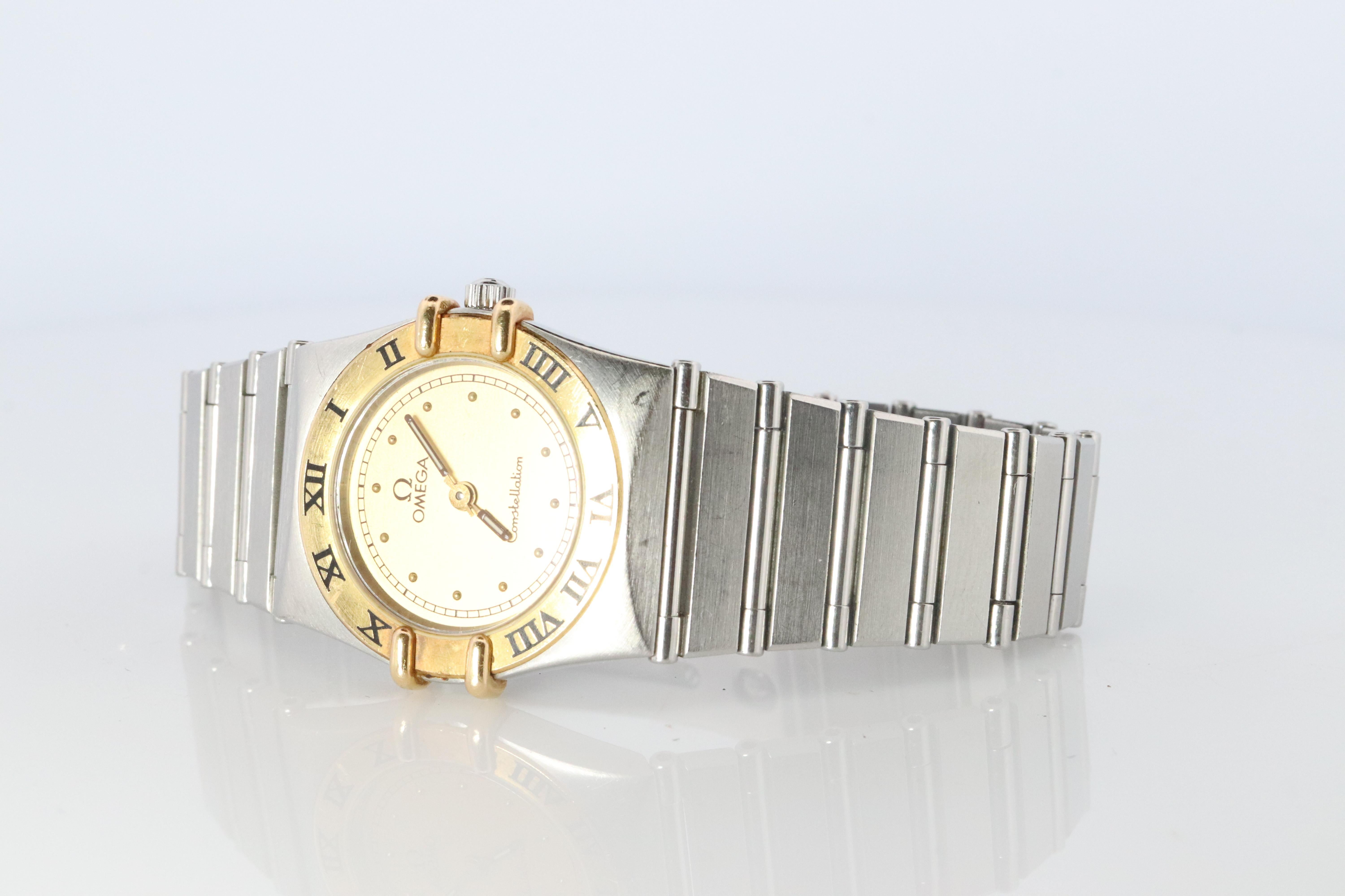 Genuine Omega Constellation Gold Dial


Stainless Steel with 18k Yellow Bezel

Condition: Great condition for the age. Limited wear. New battery installed. 


Details:
23mm case
New battery installed.
6.25in wrist size.
