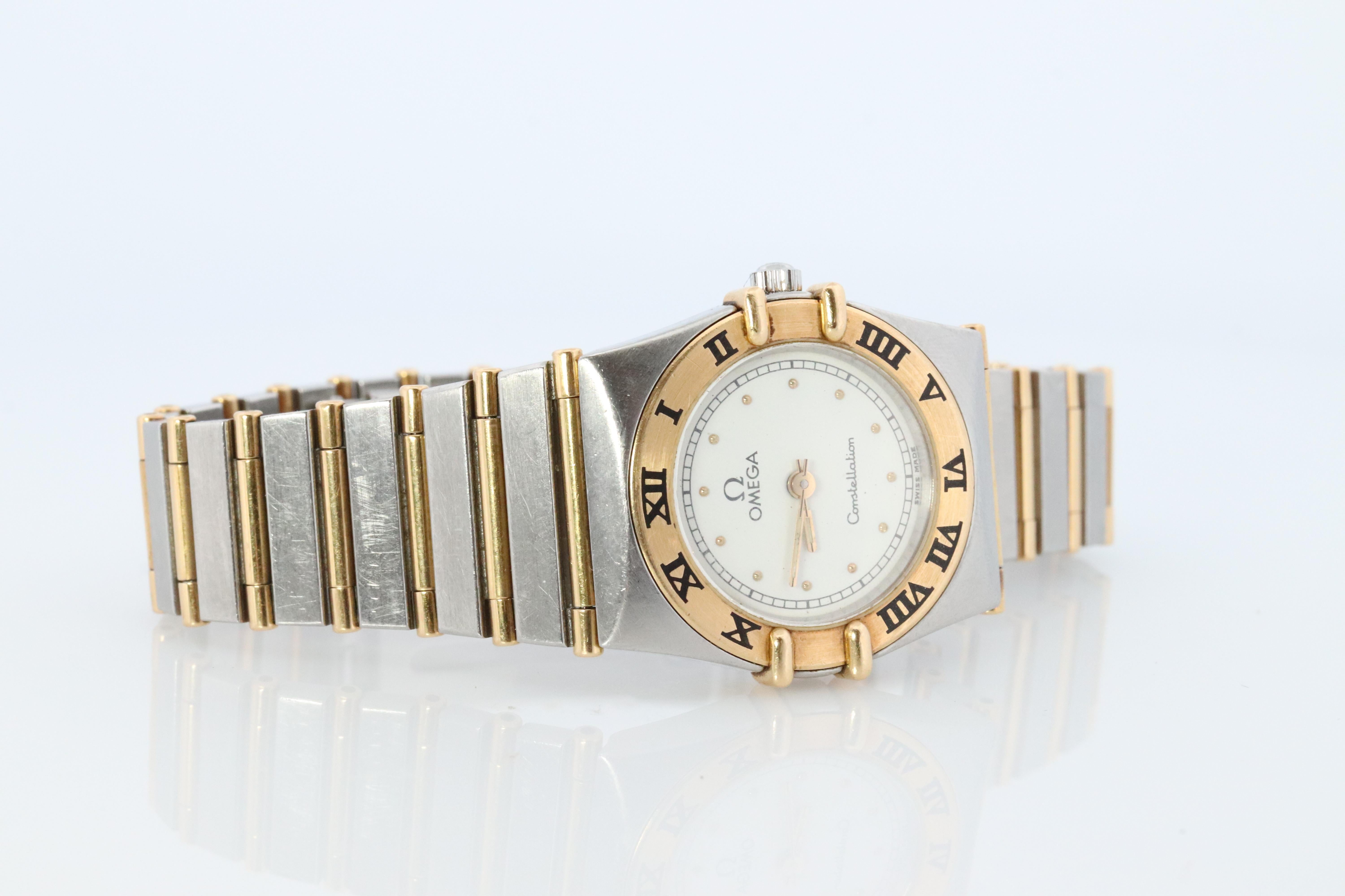Omega Uhr. Damen Omega Constellation 18k YG und SS. Herren