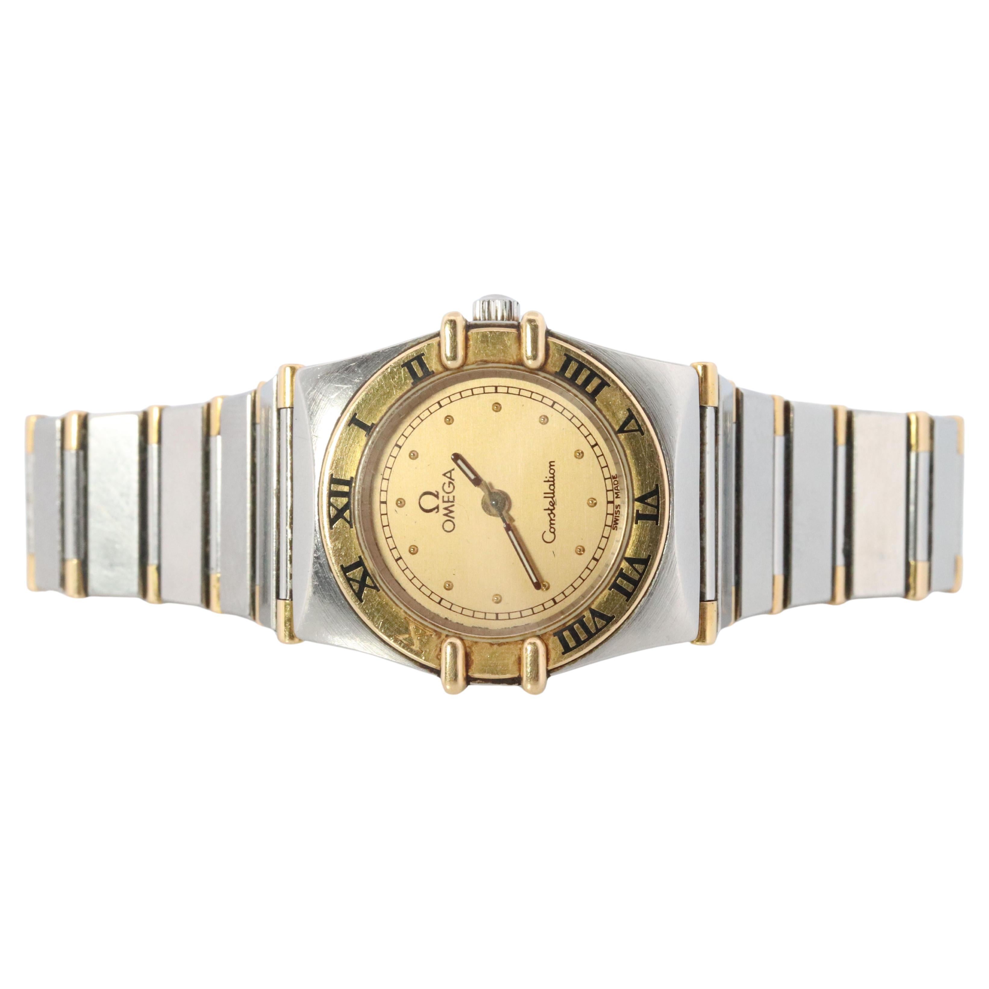 Montre Omega. Omega pour dames  Constellation 18k YG et SS.