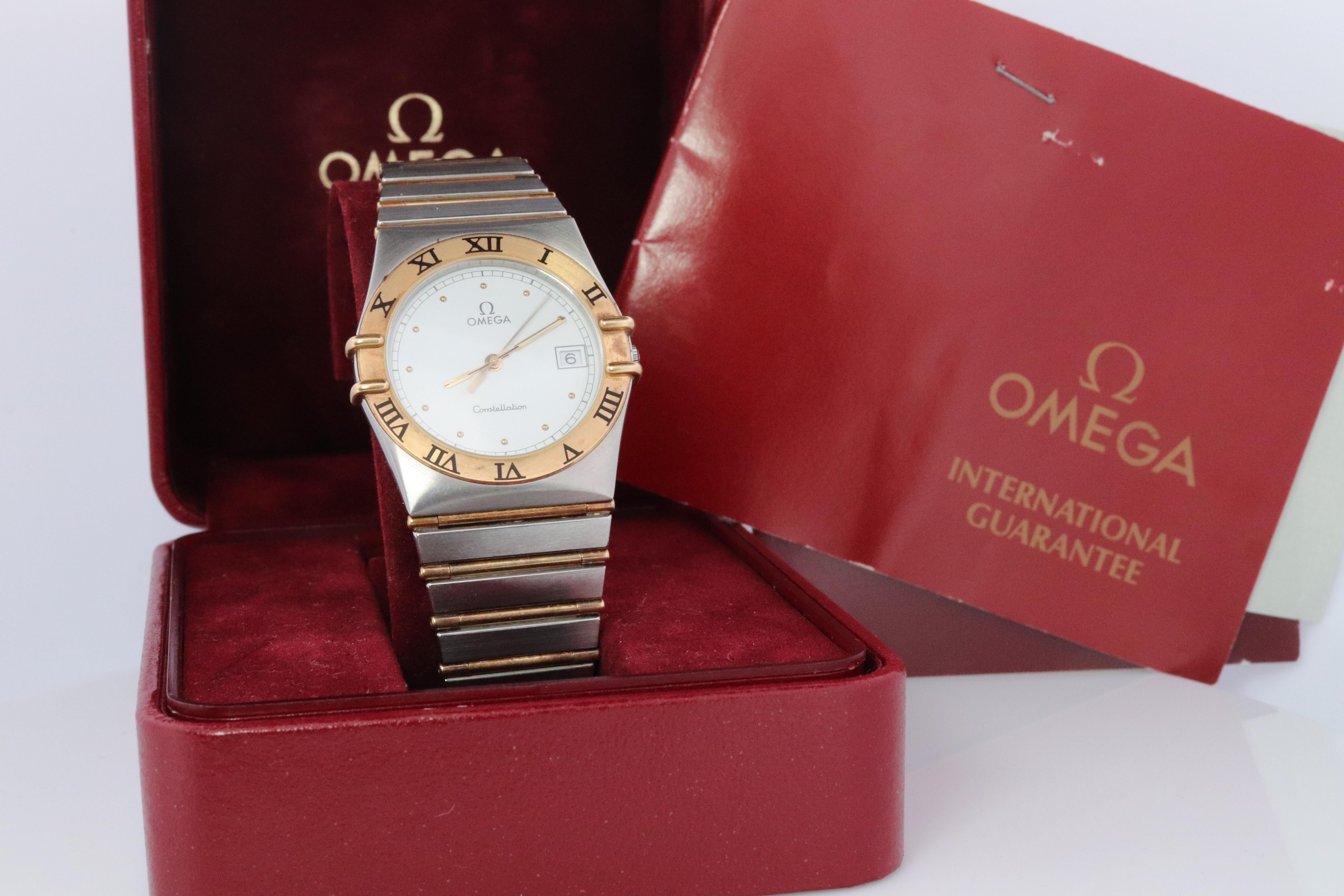Genuine Omega Constellation  1448
Ref 396 

White Dial with Date

Comes with original box, paperwork, and guarantee card.

Condition: Great condition for the age. Excellent Condition. New Battery installed.

Details:

34mm case

18k Yellow Gold
