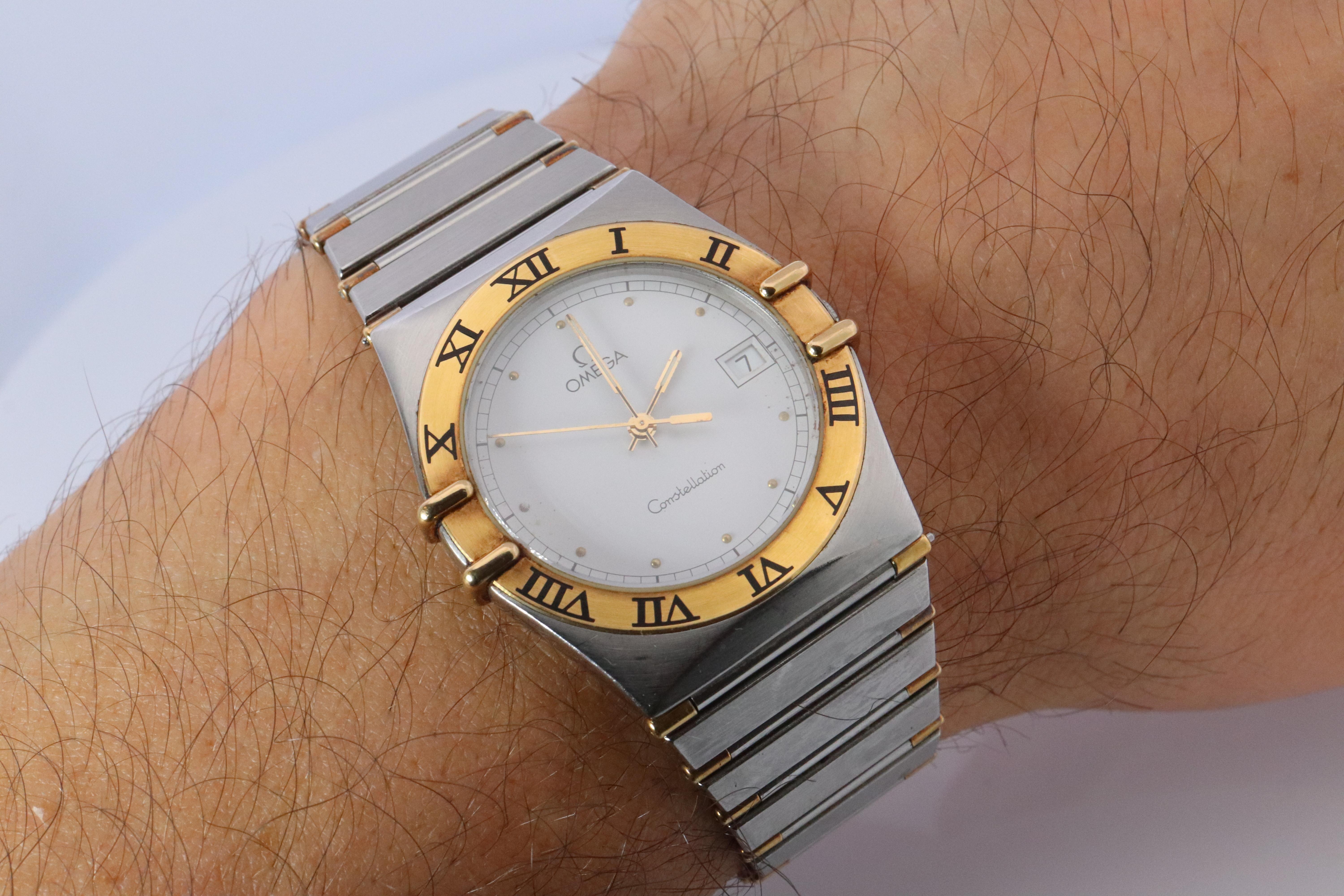 Genuine Omega Constellation 1448/431
Ref 396 

White Dial with Date

Comes with original box, paperwork, and guarantee card.

Condition: Great condition for the age. Excellent Condition. New Battery installed.

Details:

34mm case

18k Yellow Gold