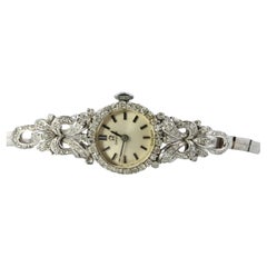 Orologio Omega. Orologio da polso da donna Omega in platino e oro 18 carati con diamanti