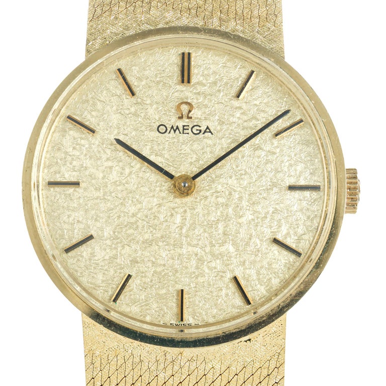 Omega Montre-bracelet unisexe en or jaune 14 carats et maille, style  mi-siècle moderne En vente sur 1stDibs