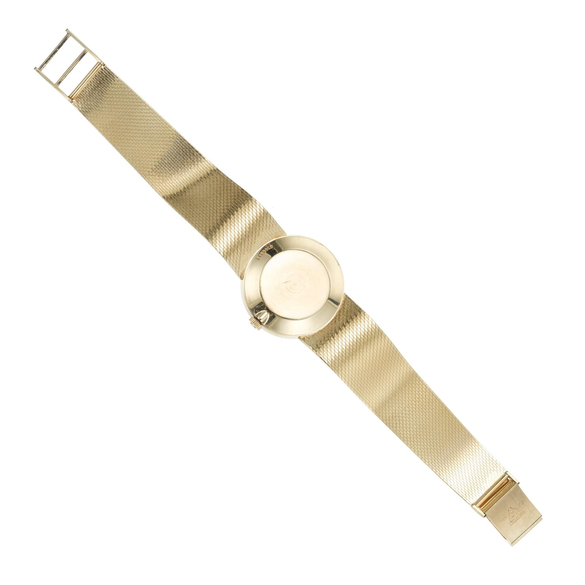 Omega Montre-bracelet unisexe en or jaune 14 carats et maille, style mi-siècle moderne en vente 1