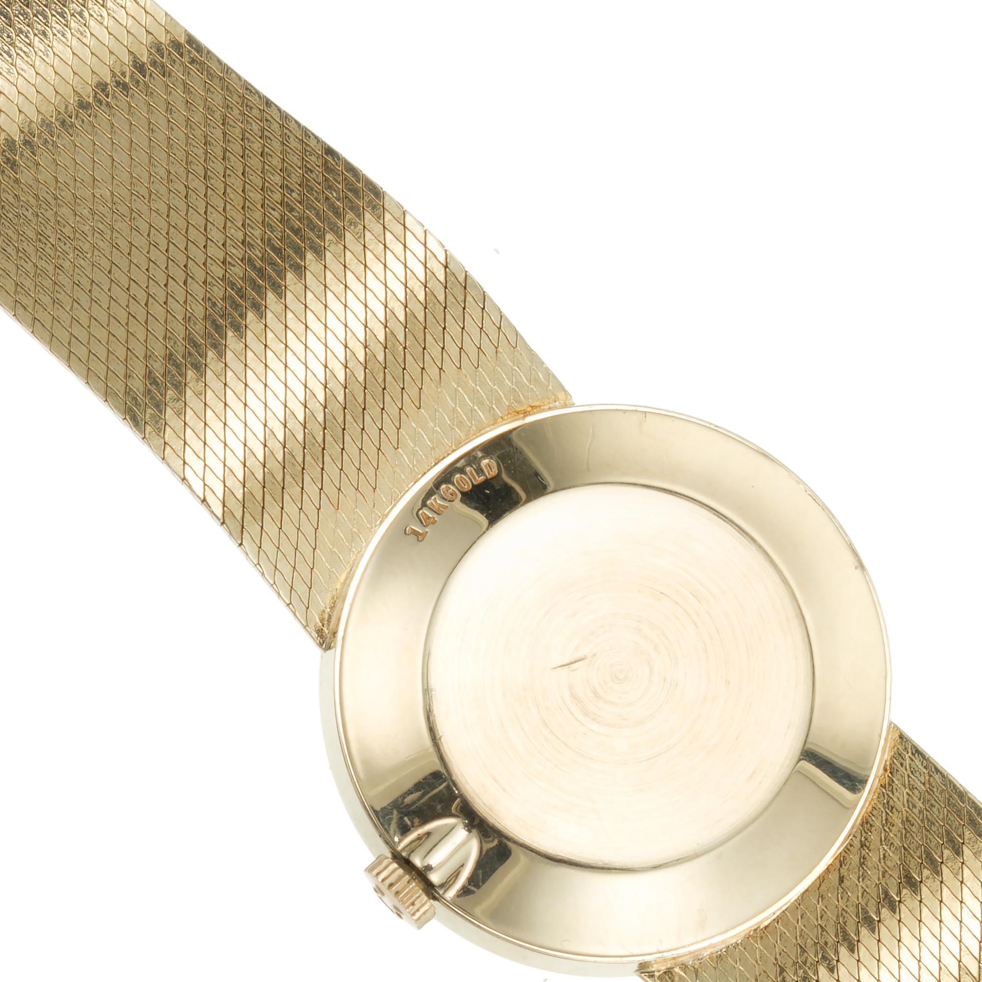 Omega Montre-bracelet unisexe en or jaune 14 carats et maille, style mi-siècle moderne en vente 2