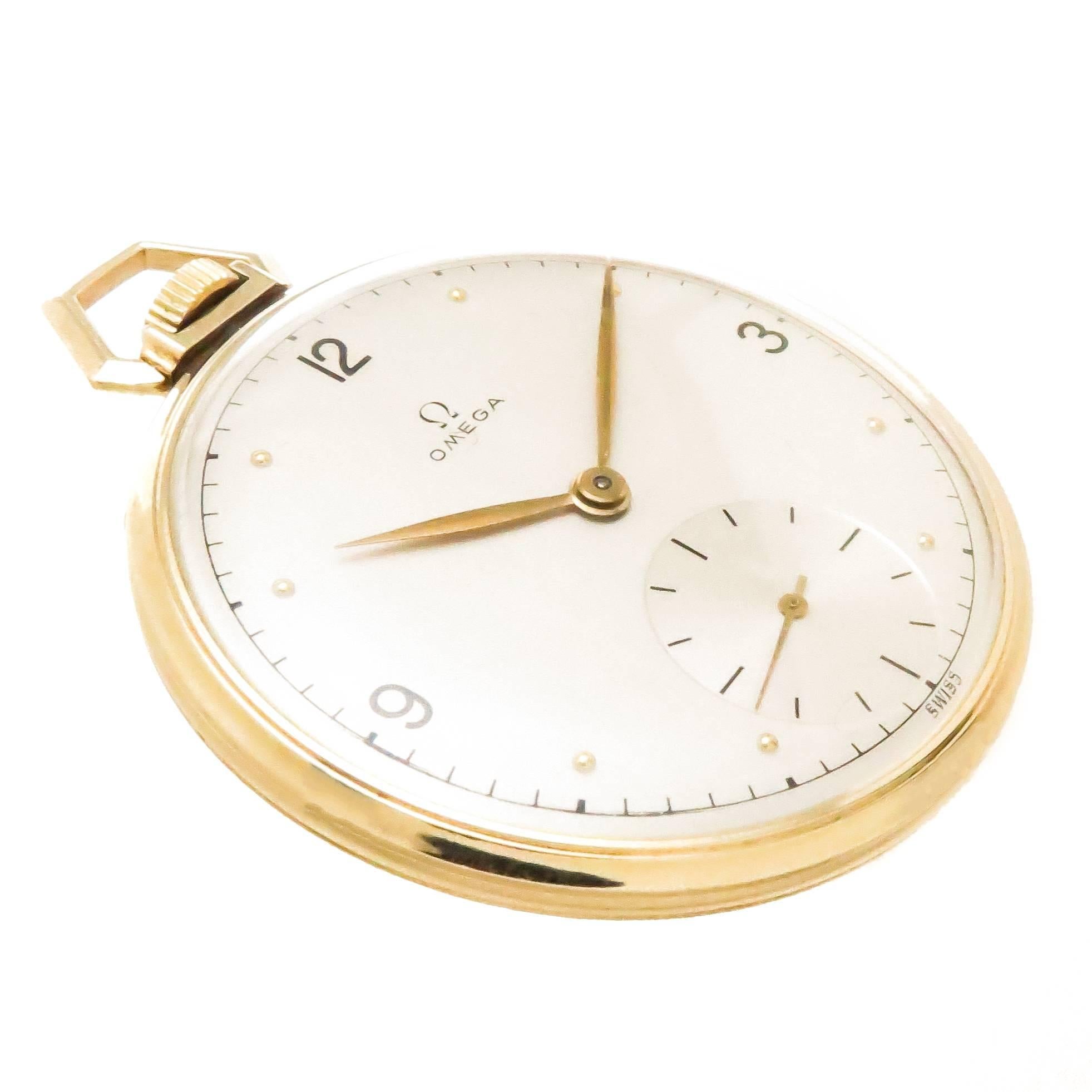 Circa 1950s Omega Pocket watch, 44 MM Yellow Gold Filled signed Omega Case, mechanical, manual wind 17 Jewel Movement. Silvered Dial with Raised Gold markers and a sub seconds chapter. Excellent, near mint condition overall. 