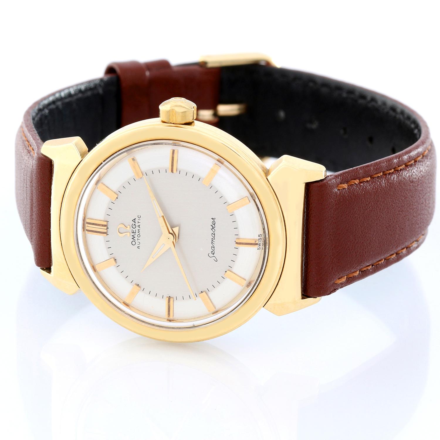 Omega Automatic Seamaster Men's Watch  - Automatic winding. Gold filled ( 32 mm ). Silvered dial with Yellow gold baton indexes. Brown leather strap band. Pre-owned with custom box. 