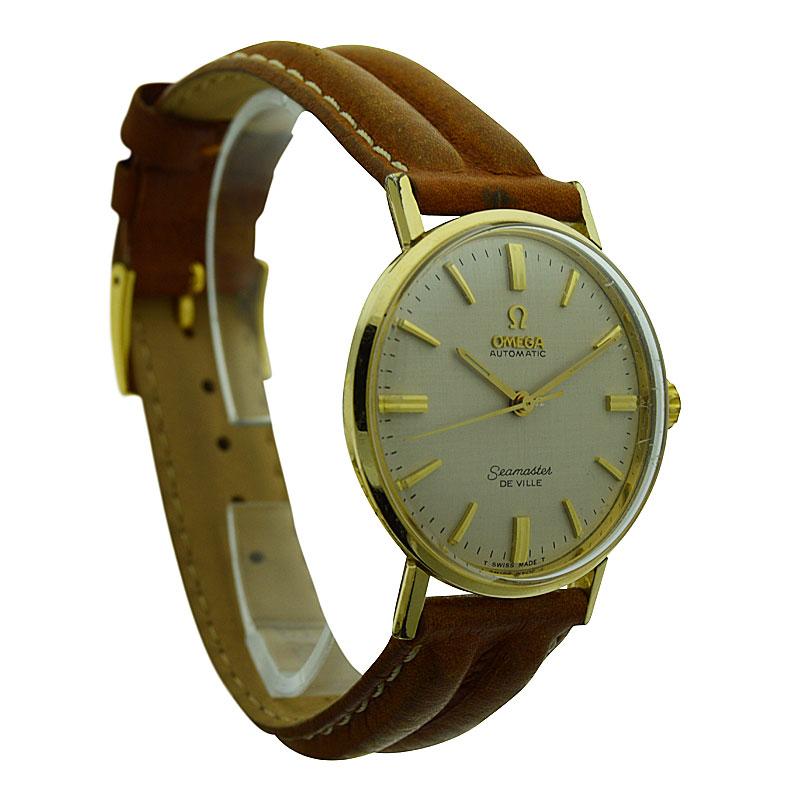 FACTORY / HOUSE: Omega Seamaster DeVille
STYLE / REFERENCE: Mid Century
METAL / MATERIAL: 14 Kt Gold Filled
DIMENSIONS: 37 mm X 34 mm
CIRCA: 1960's
MOVEMENT / CALIBER: Automatic Winding / 17 Jewels
ATTACHMENT / LENGTH:  Leather, 18 mm / Regular