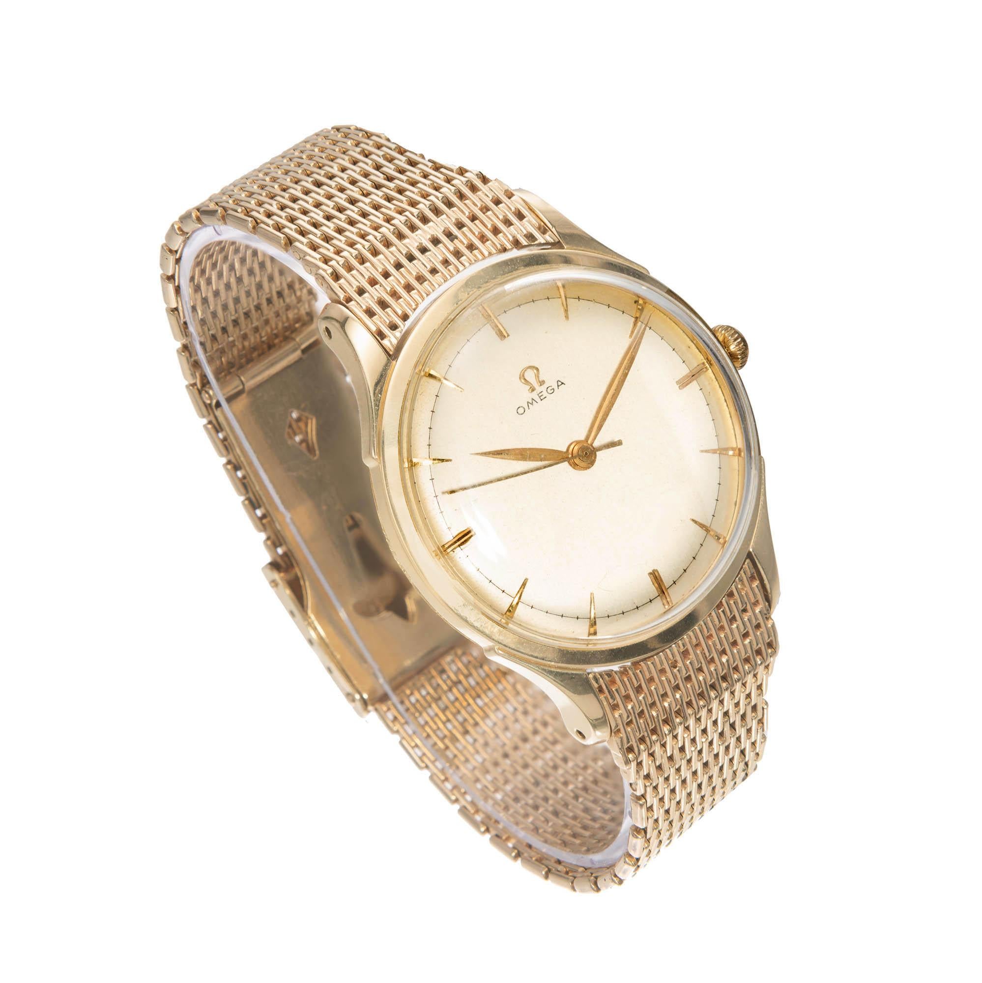 Classic 1950’s mens 14k yellow gold Omega 371 manual wind omega movement wristwatch 

14k Yellow Gold
74.9 Grams
Length: 43.25
Width: 35mm
Case Thickness: 9.72mm
Crystal: Acrylic 
Dial: Light champagne with gold marks
Length: 7 ½ Inches 
Inside