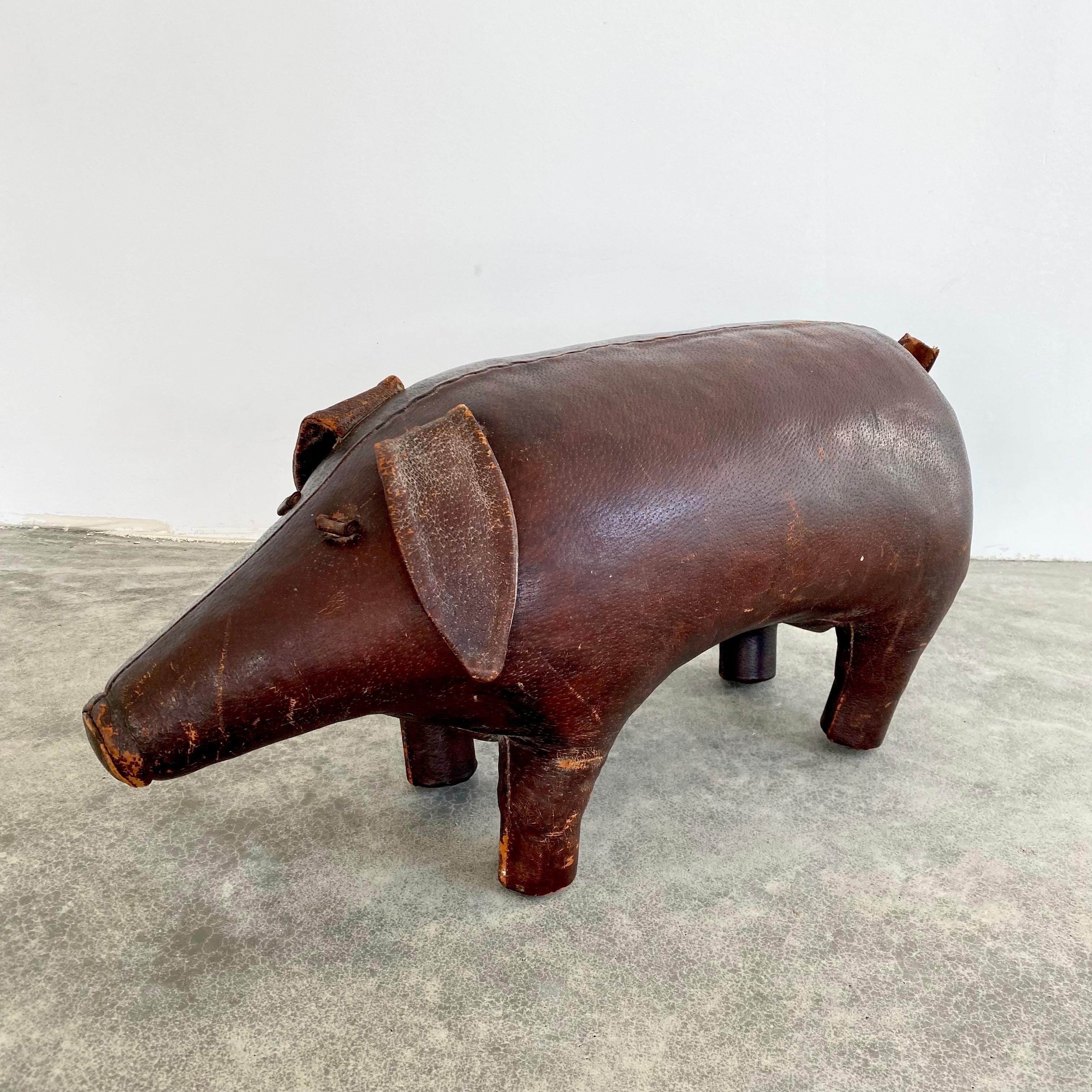 antique leather pig footstool