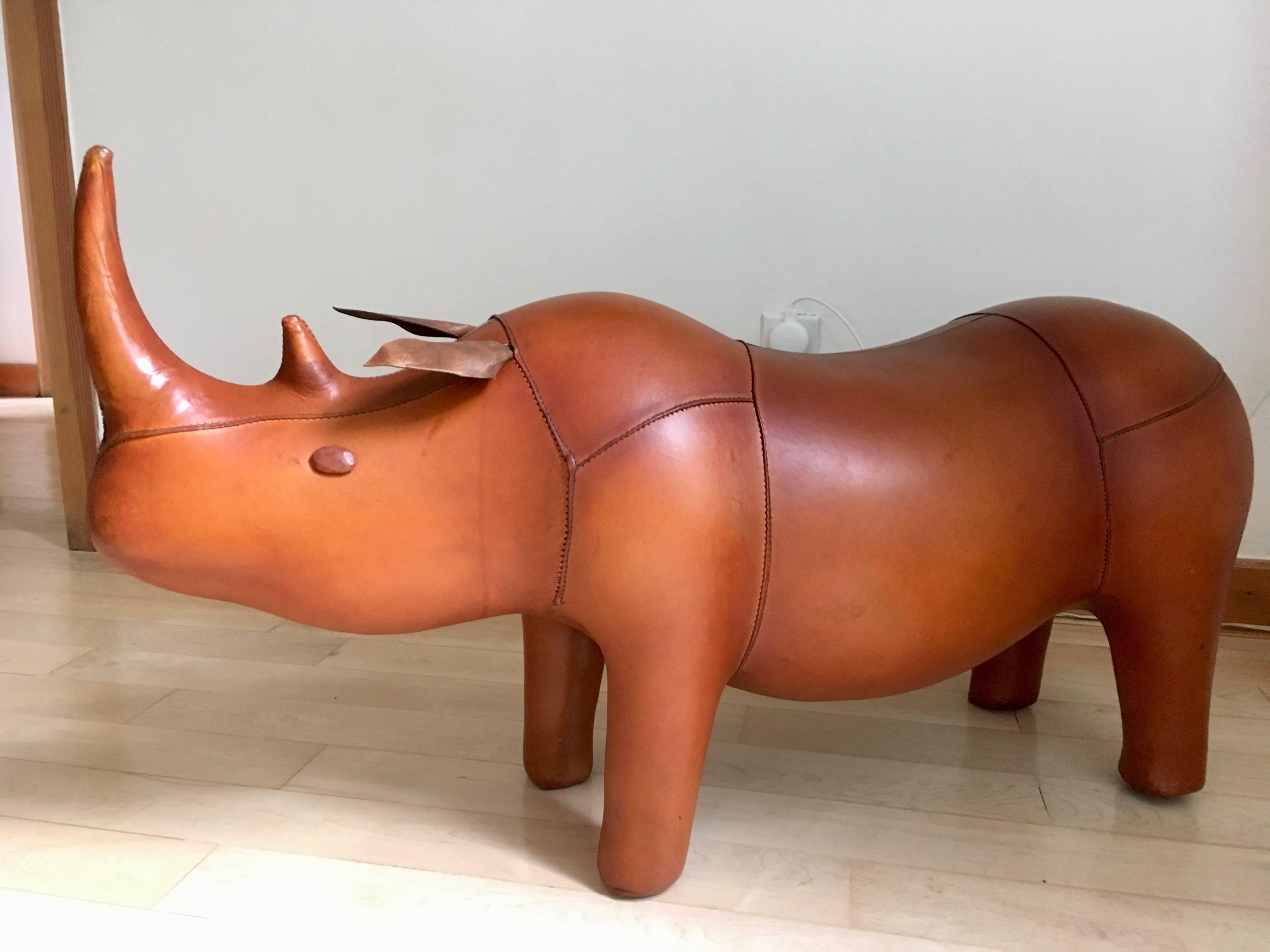 Handsome leather rhinoceros by Omersa. Very sturdy stool or footstool. Also a great sculptural object. Beautiful patina to leather. Excellent condition.