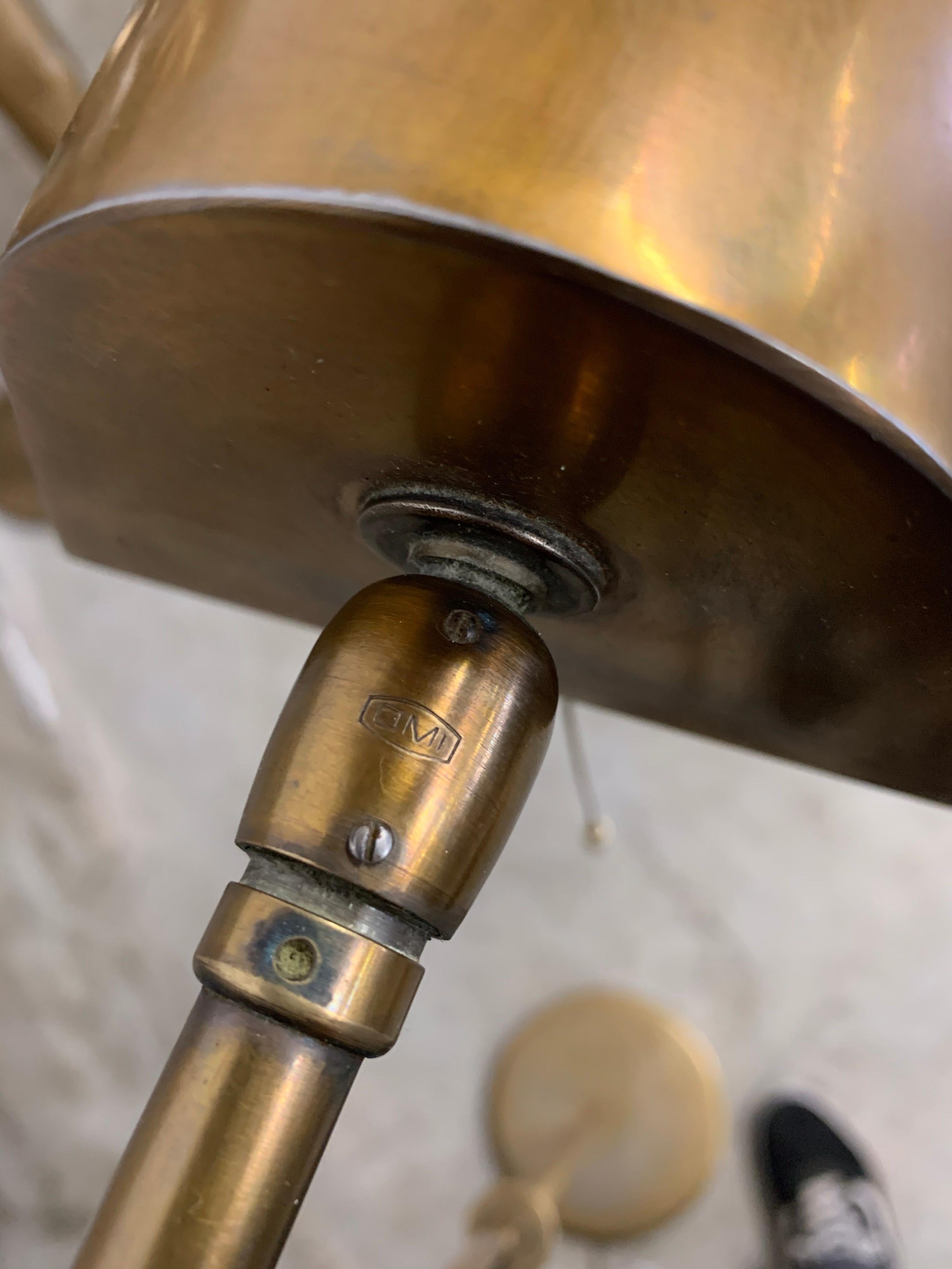 Beautiful brass / copper colored (notary / reading) floor lamp from the 1960s by OMI by Koch & Lowy. Nice vintage condition with pull switch. Marked on the top. Nice piece of old usable design. Standard European power plug.

Measures: Height 126