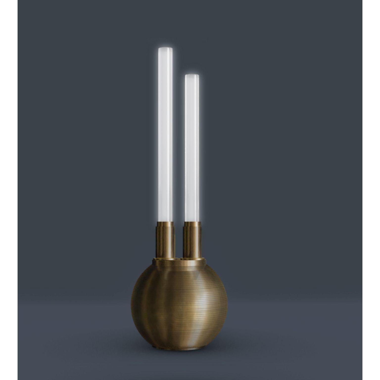 Omicron floor lamp, Jan Garncarek
Dimensions: 40 x 127 cm
Material: Raw brass, frozen glass
Handcrafted by Jan Garncarek.
Signed 

Information: 
weight: 15 kg / 33 lb
voltage: 120V, 240V
lamping: 2 X 1 2 W dimmable LED module
lumens: 800