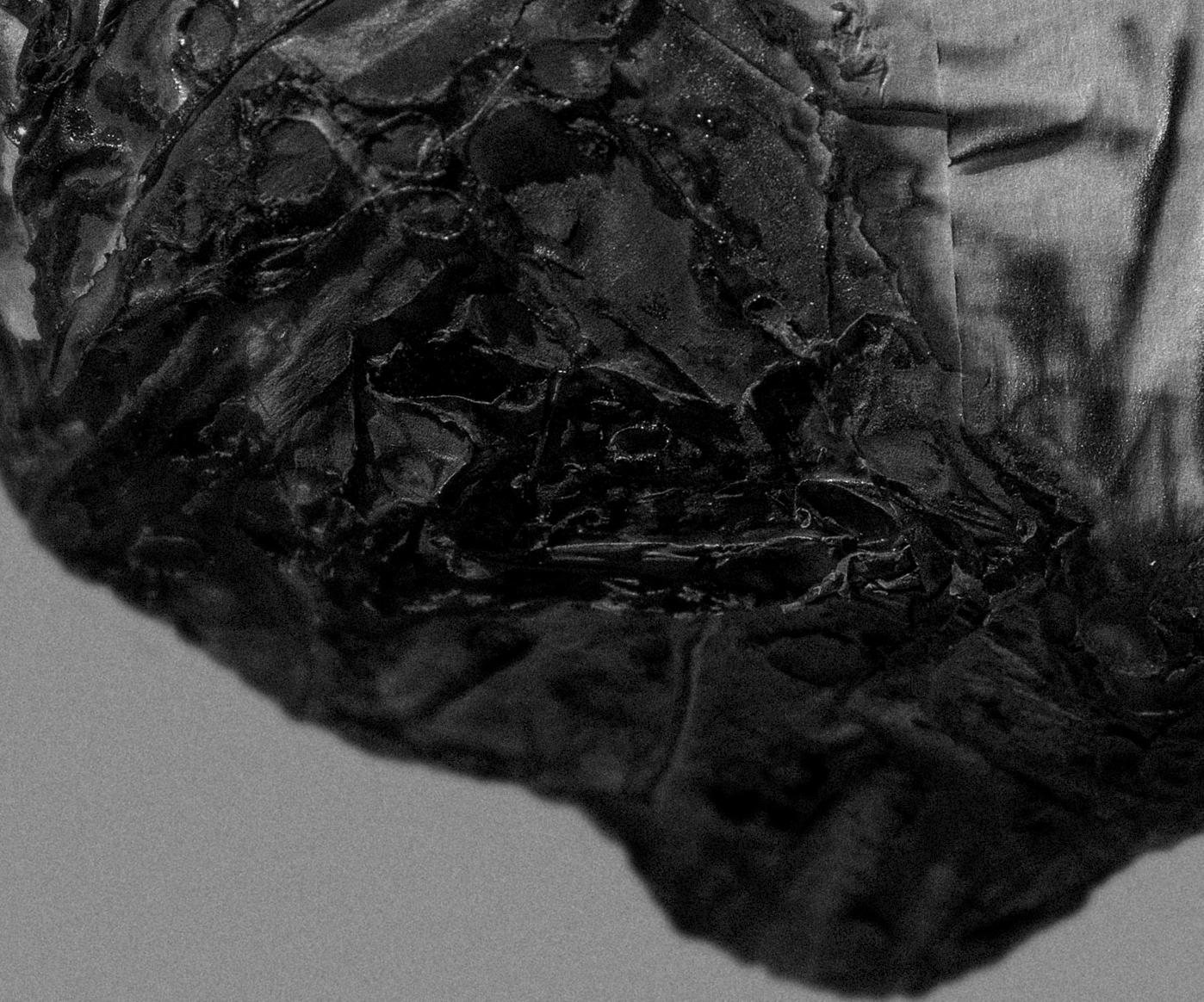 A rock cannot burnt to ashes. Abstract black and white photograph - Minimalist Photograph by On Hansen