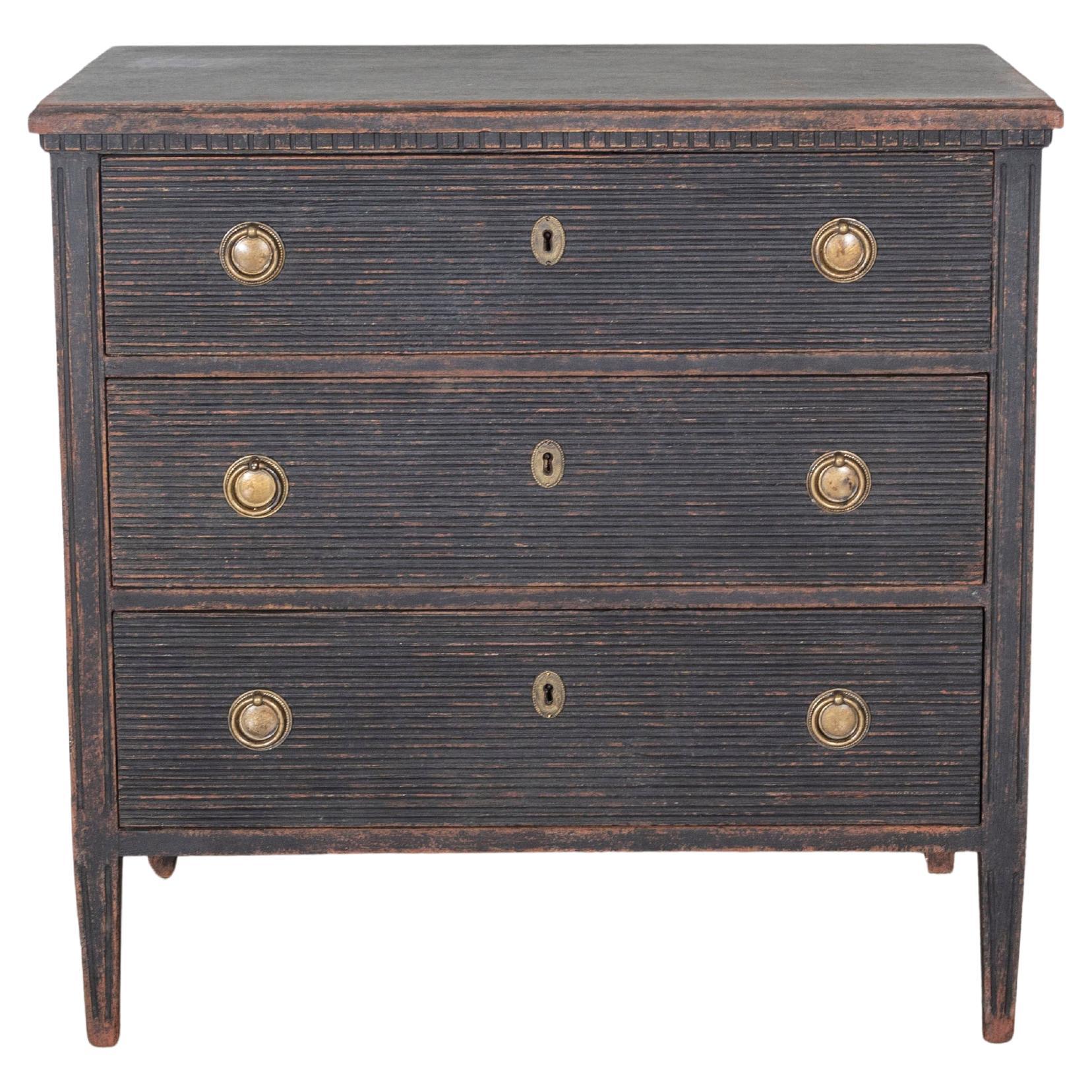 ON HOLD -A Gustavian style chest of drawers in black with beautiful patina For Sale