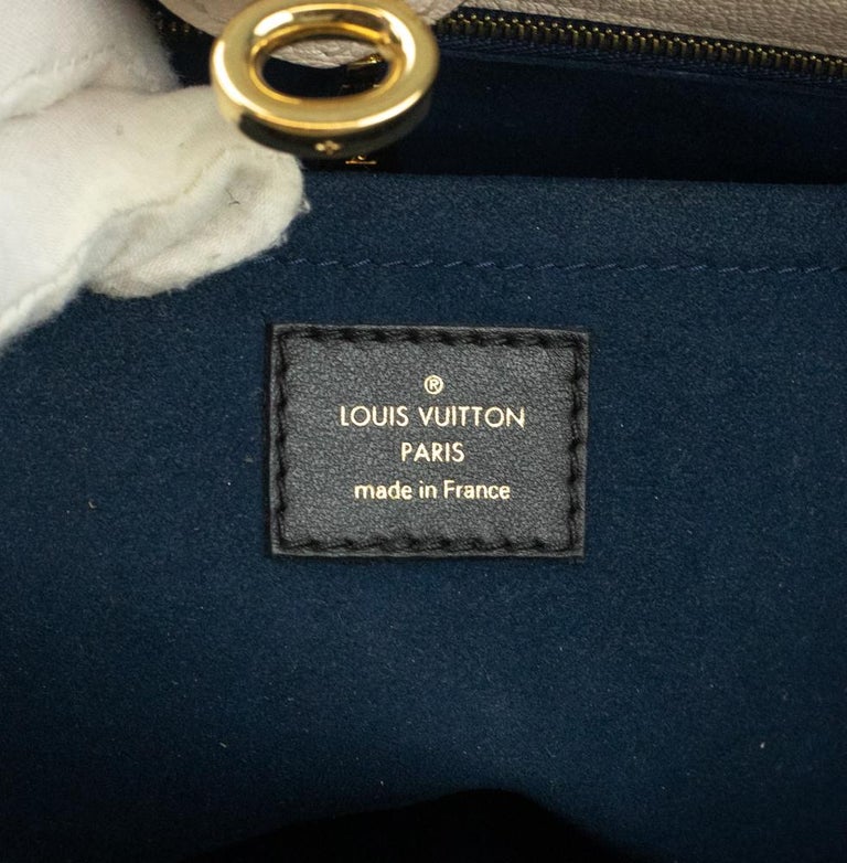 On my side leather handbag Louis Vuitton Blue in Leather - 32410373