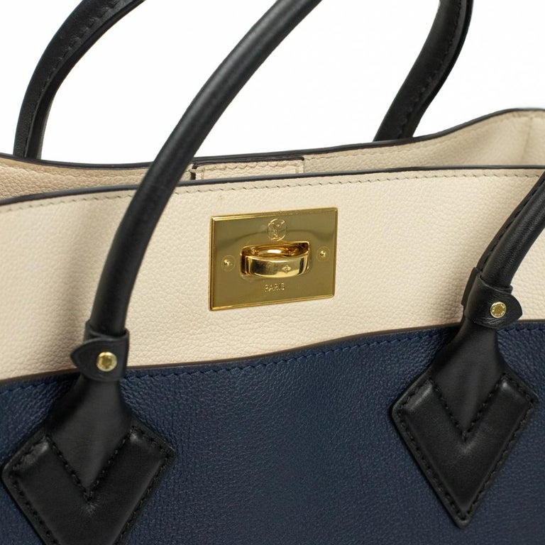 On my side leather handbag Louis Vuitton Blue in Leather - 30686451