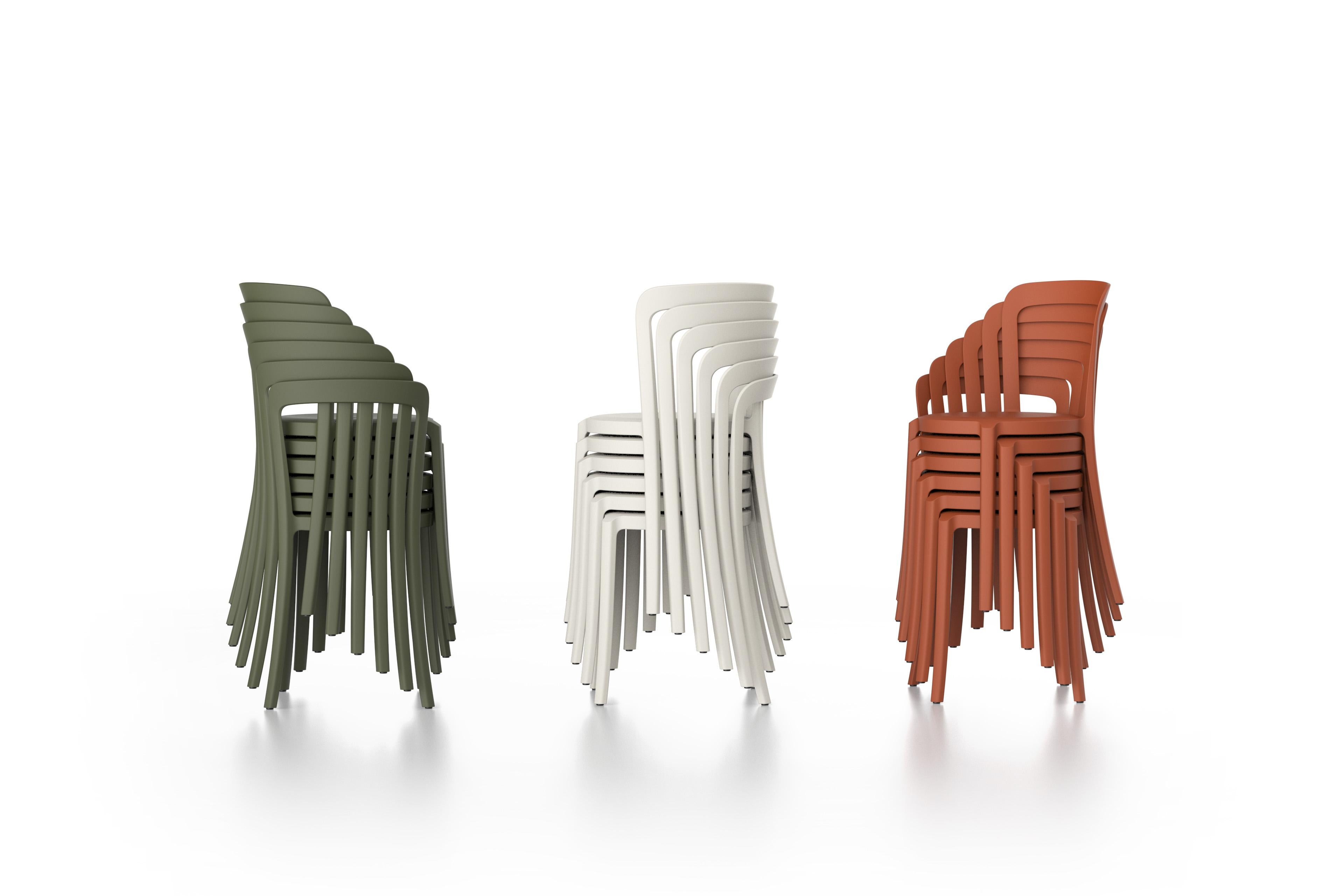 white plastic stacking chairs