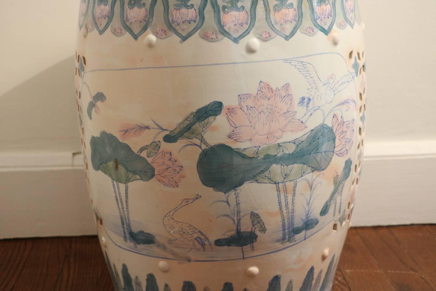 Lotus, cranes and dragon flies oh my! Ruan Cai garden stool. Opaque palette with a softer and gentler color palette or Ruan Cai (soft colors). Beautiful porcelain garden stool cut-out designs with raised bosses and a glossy finish. Lovely mellow
