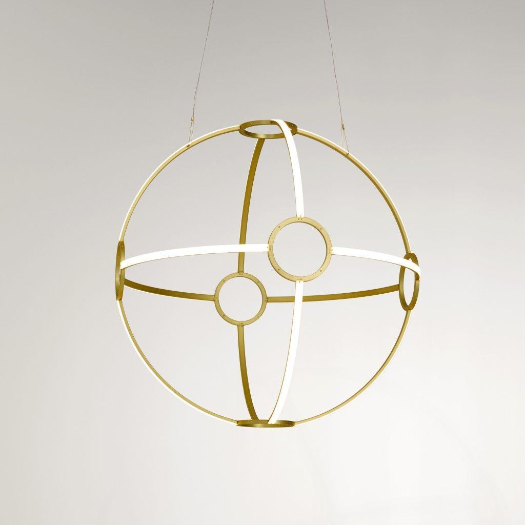 ONA 70 by Kaia
Dimensions: Ø75.4 cm
LED technology, 24 V*, Warm White 
2.700 K 13.350 lm
Materials: Brushed Brass, Transparent Cable

Also Available: Different materials

All our lamps can be wired according to each country. If sold to the