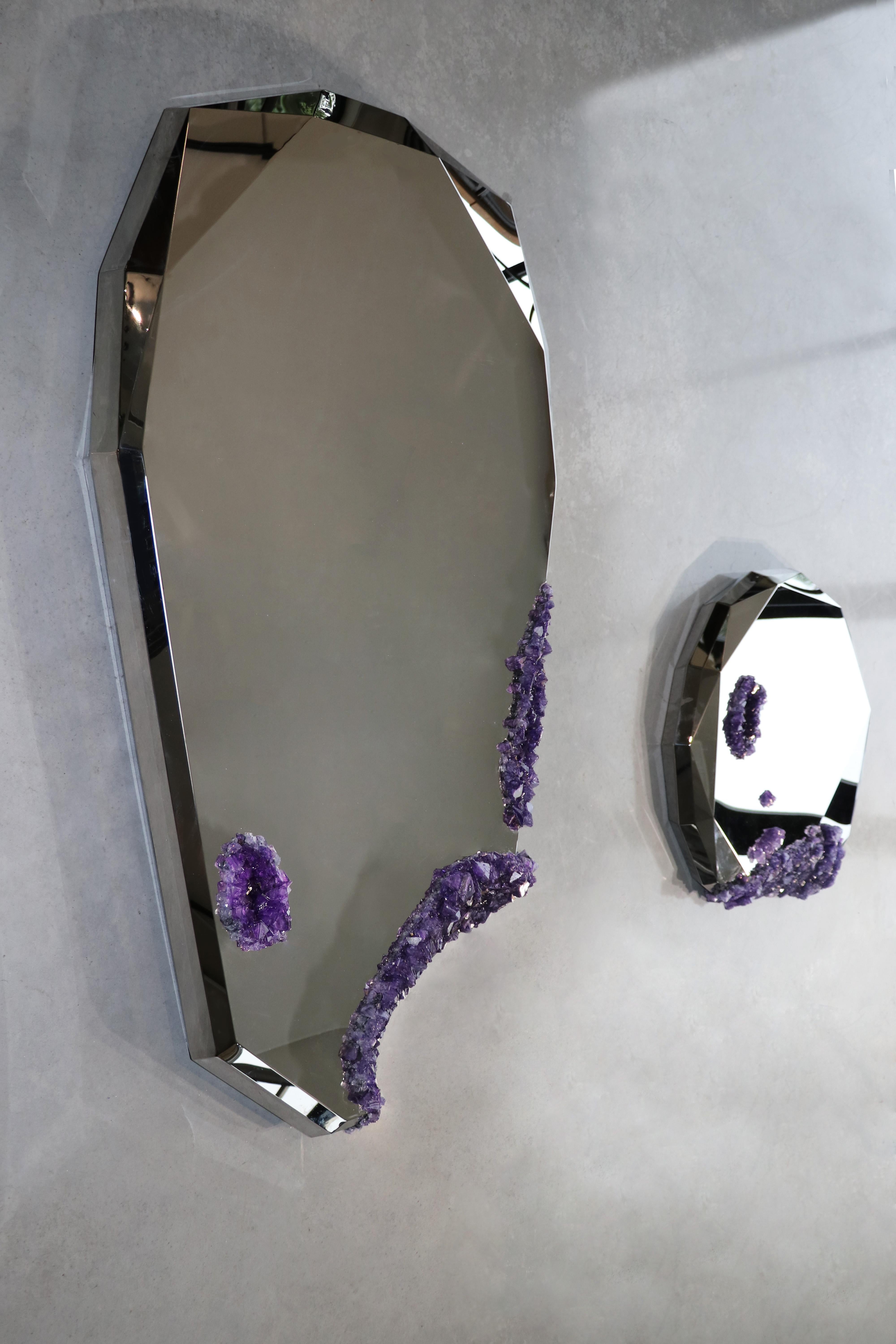 Once upon a time Harmonia mirror by Mark Sturkenboom
Edition of 10
Dimensions: 151 × 86 × 9 cm
Material: Stainless steel, mineral crystals

Our environment is cluttered with the artifacts of human habitation, leading one to wonder, “How would