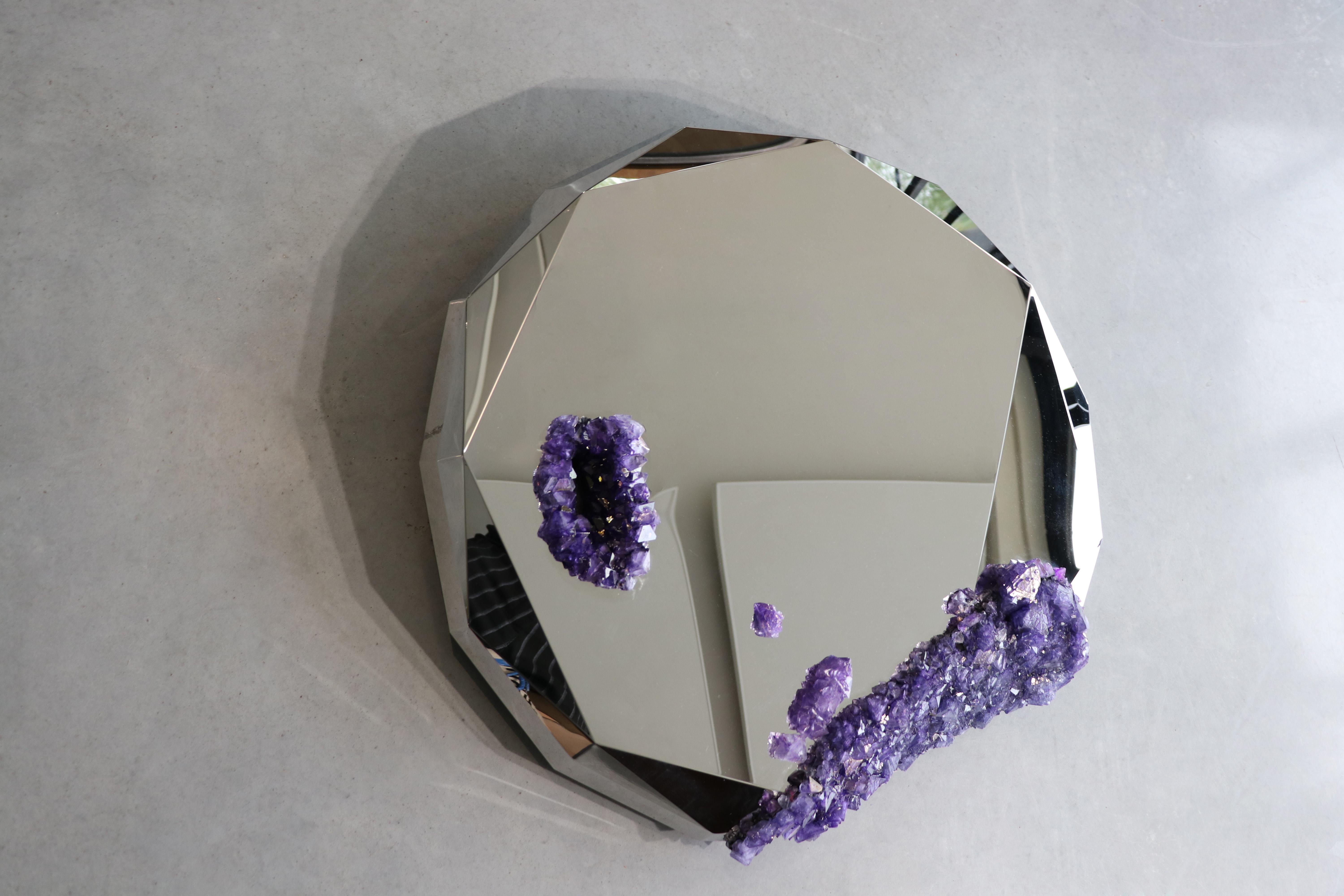 Once upon a time Hypnos mirror by Mark Sturkenboom
Edition of 10
Dimensions: 74 × 75 × 8 cm
Material: Stainless steel, mineral crystals

Our environment is cluttered with the artifacts of human habitation, leading one to wonder, “How would the