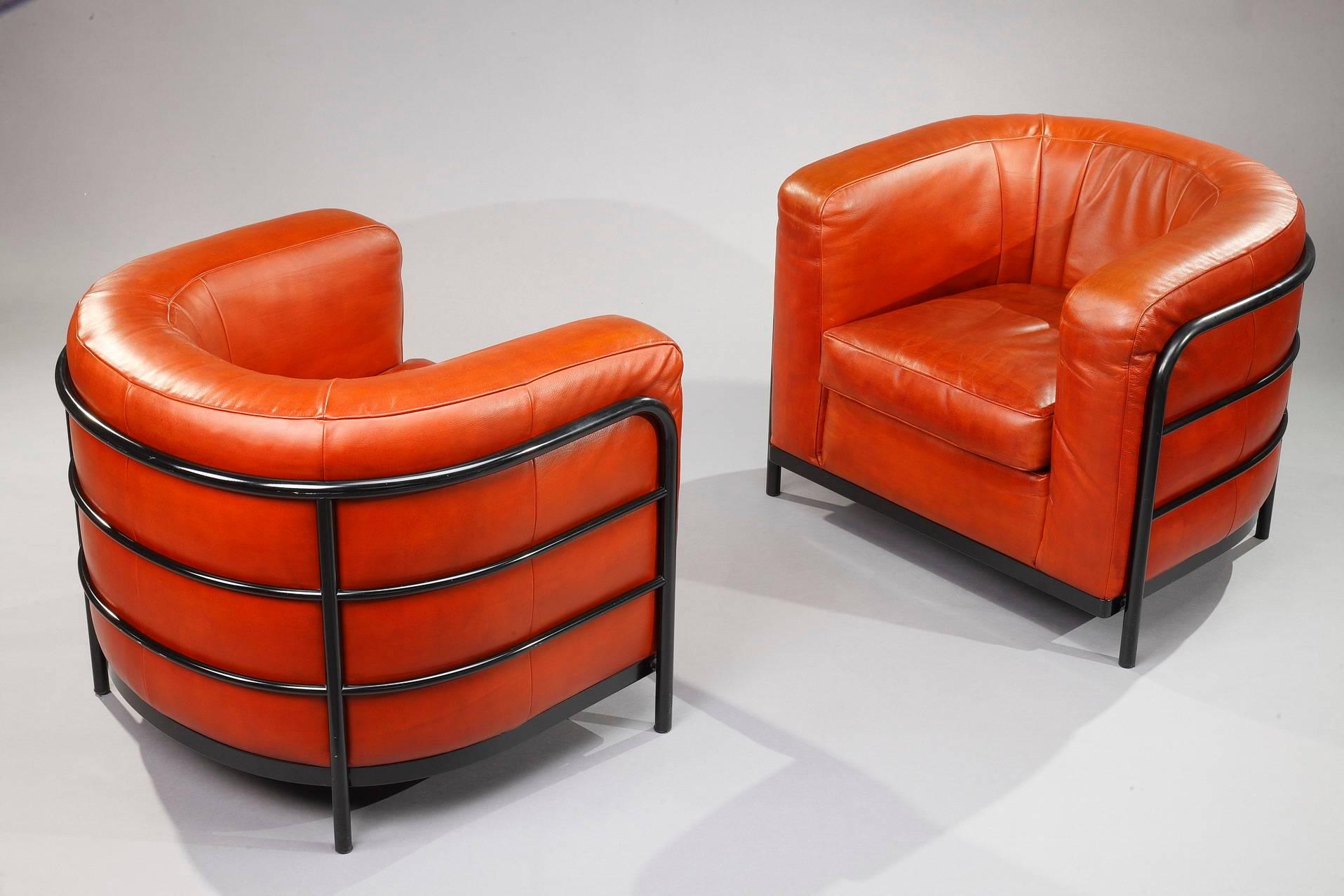 Pair of Onda armchairs in orange leather designed by Paolo Lomazzi, Jonathan de Pas and Donato D’Urbino in 1985 for Zanotta. Black lacquered metal structure and feet. Each item is labelled Zanotta Italy and numbered,

circa 1980
Dimension: W 34.6