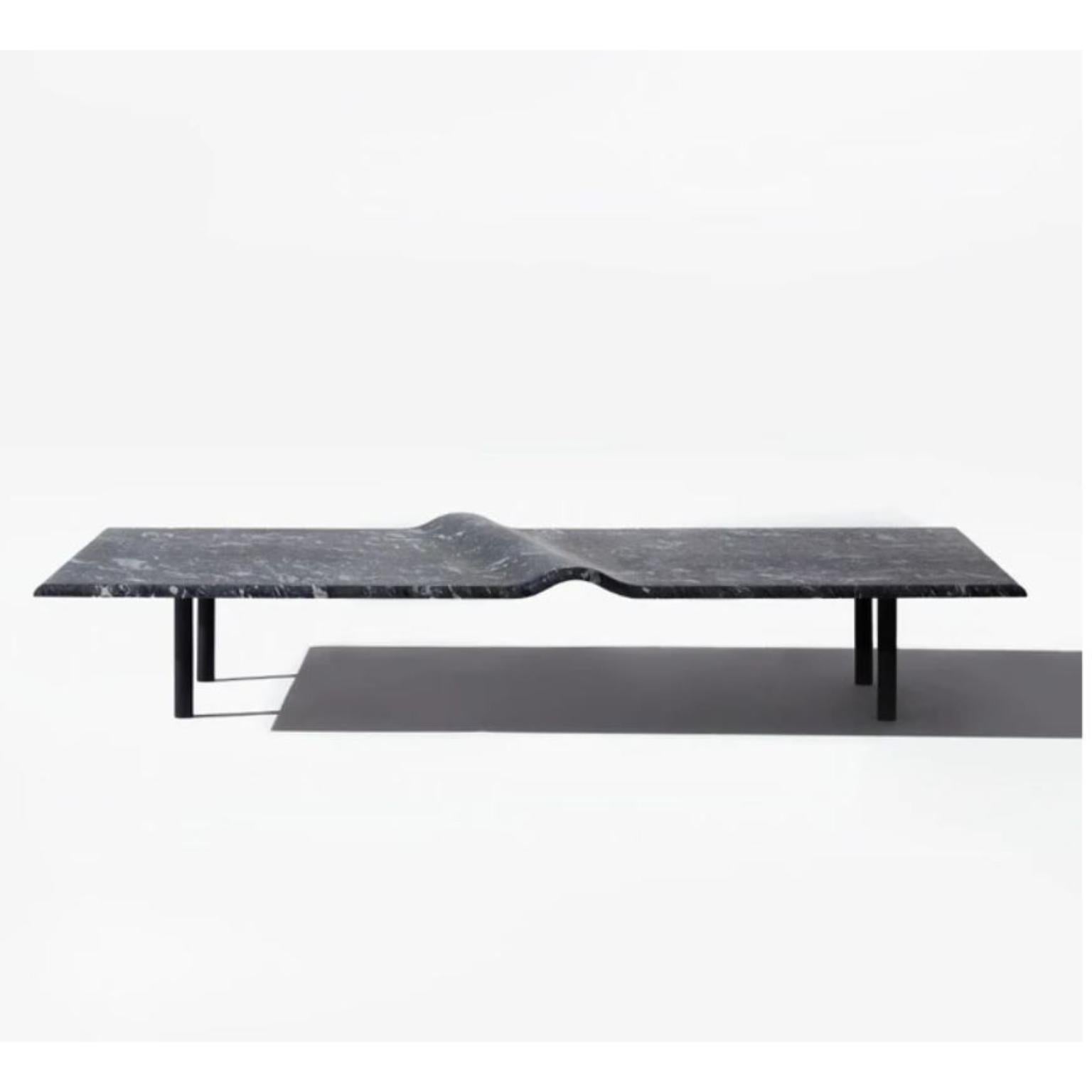Onda Coffee Table by Wentz
Dimensions: D 80 x W 160 x H 28 cm
Materials: Granite/Quartzite, Steel/Stainless Steel.

The Onda Center Table is associated with the image of the sea. The sculpture in the granite stone creates the perfect curve – marked