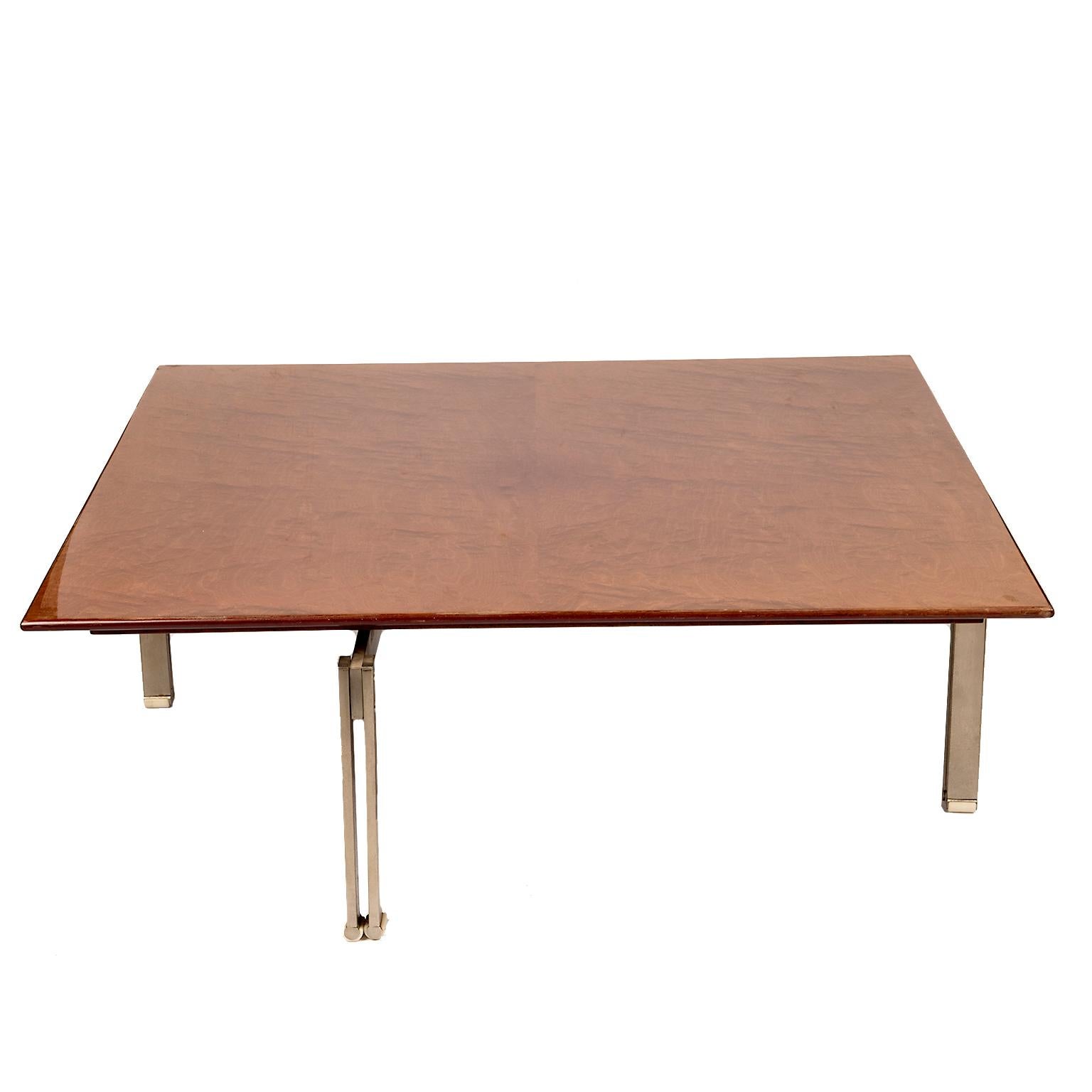 A gorgeous lacquered figured wood table with stainless brushed steel base.
Two available at time of listing.