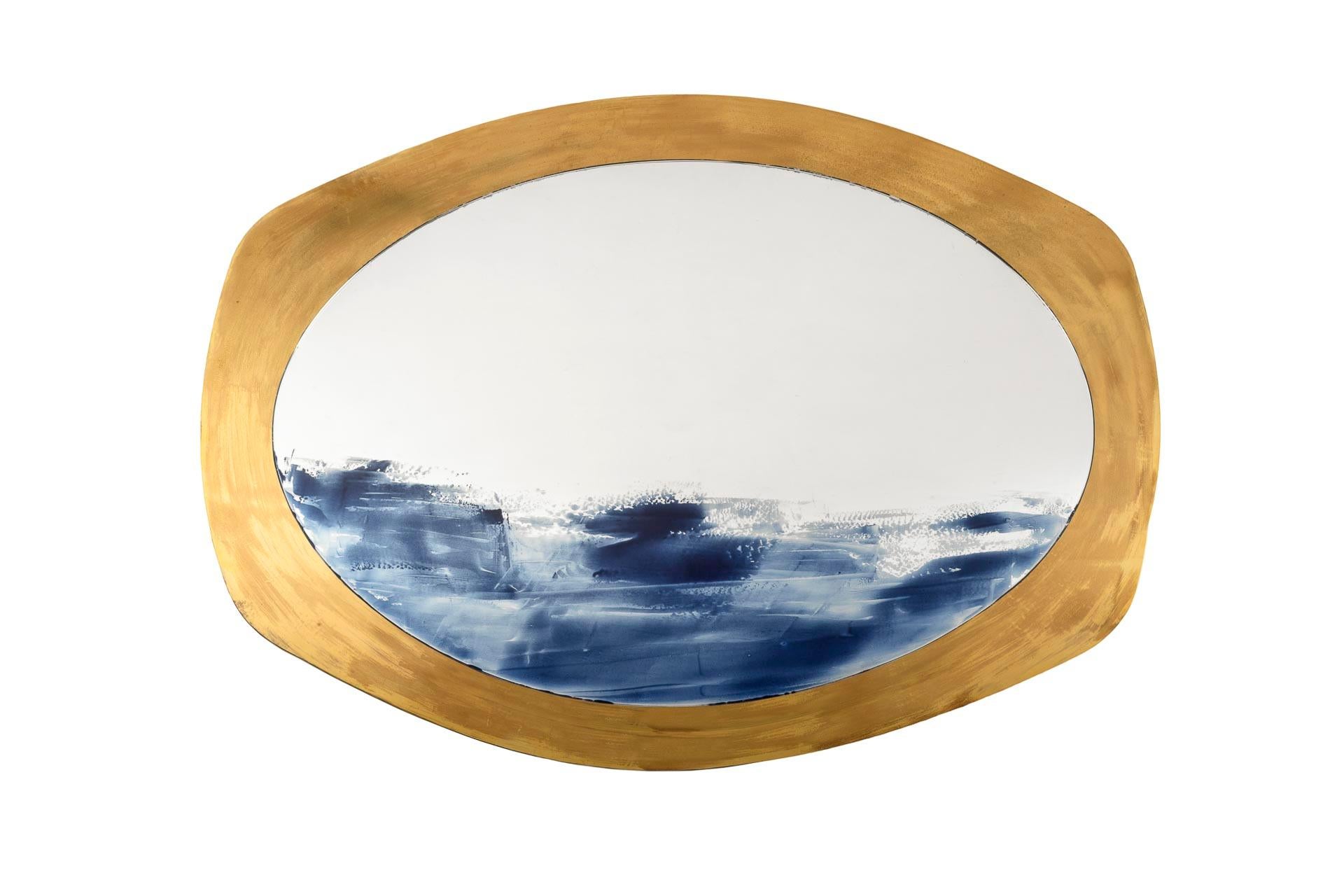 This mirror composition is the result of two-dimensional shapes arranged in two different layers. front sheet: ultra white low iron 5 mm float glass, edge polished, hand-painted with hand-brushed blue ceramic enamels melted on the surface during the