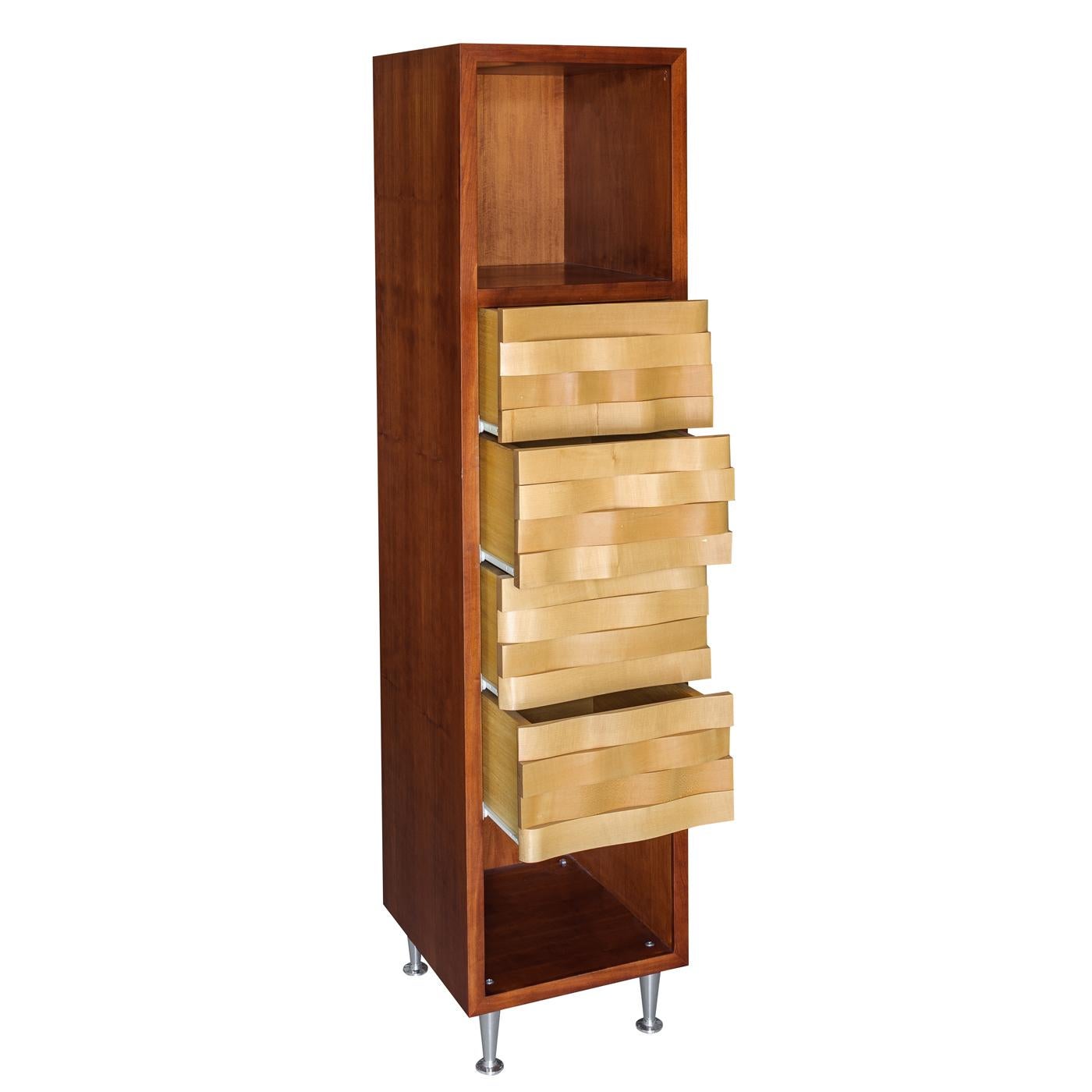 Exceptional construction and masterful craftsmanship define this stunning cabinet. Fashioned entirely of cherrywood, this tall, rectangular cabinet features two open shelves and four drawers and is supported by conical metal feet. The linearity of
