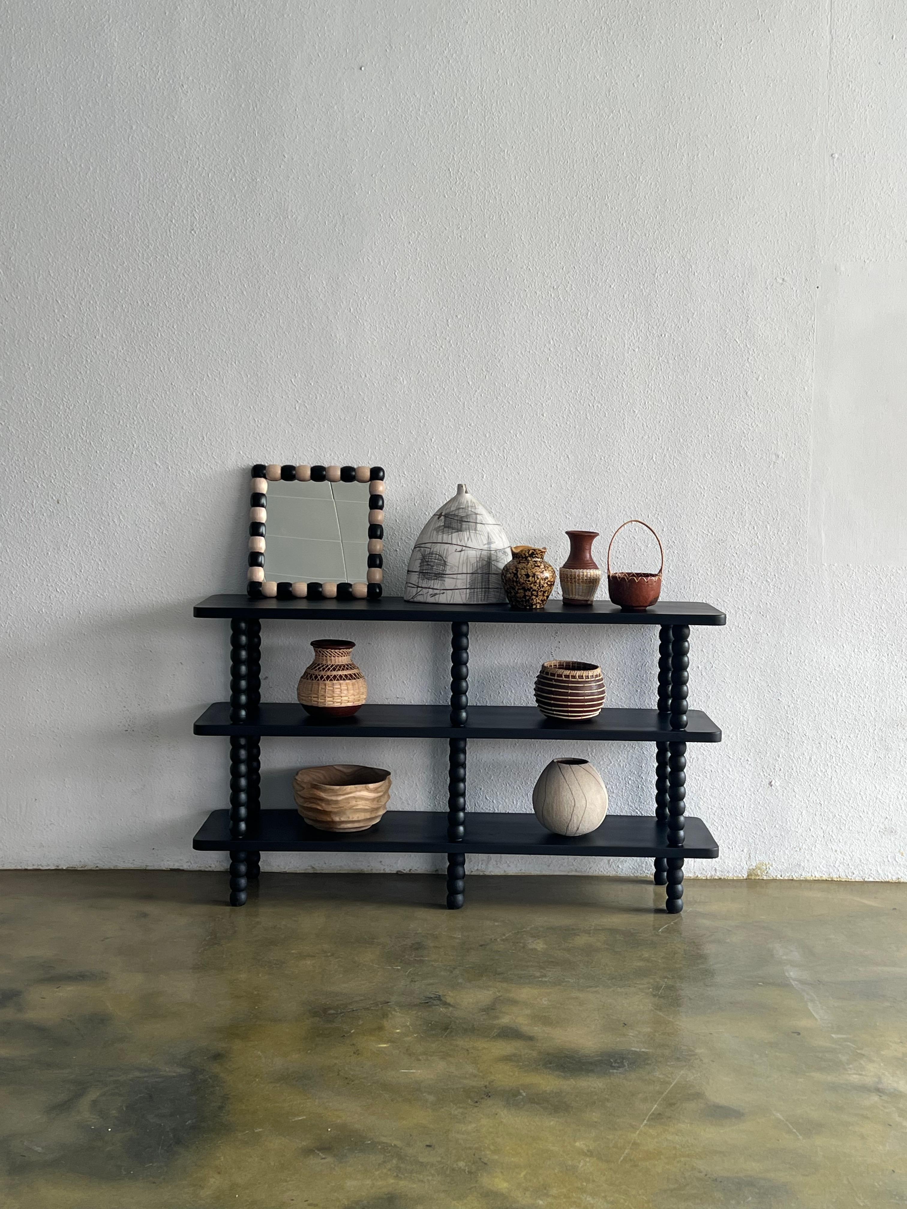 Onde Shelf by Studio Kallang
Dimensions: W 120 x D 38 x H 86 cm
Materials: Solid Teak.
Finish: All Black (L), Natural + Black (R)
Square or Rounded Corners.

STUDIO KALLANG IS A SINGAPORE AND SEATTLE BASED PROJECT FOCUSING ON OBJECTS DESIGNED BY