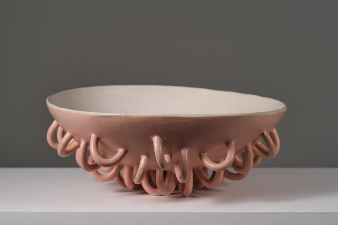 Working from ceramics as a broad discipline that includes design, sculpture and painting, this work belongs to a collection of objects in which the forceful volumetries dialogue with fragility, balance and color.

She has a degree on Ceramic and
