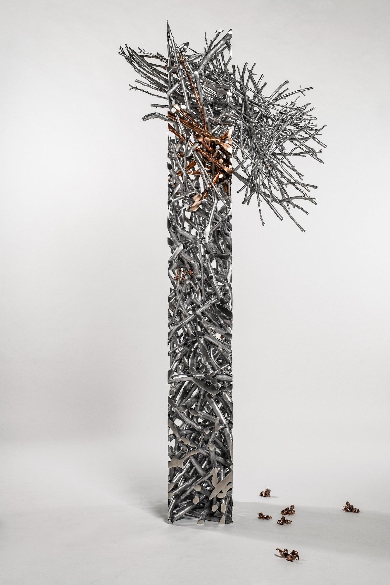 Instant Tree Olives est une sculpture en aluminium et en bronze du sculpteur tchèque contemporain Ondřej Oliva, dont les dimensions sont de 182 × 78 × 39 cm (71,7 × 30,7 × 15,4 in).
Cette sculpture est une pièce unique signée par l'artiste et