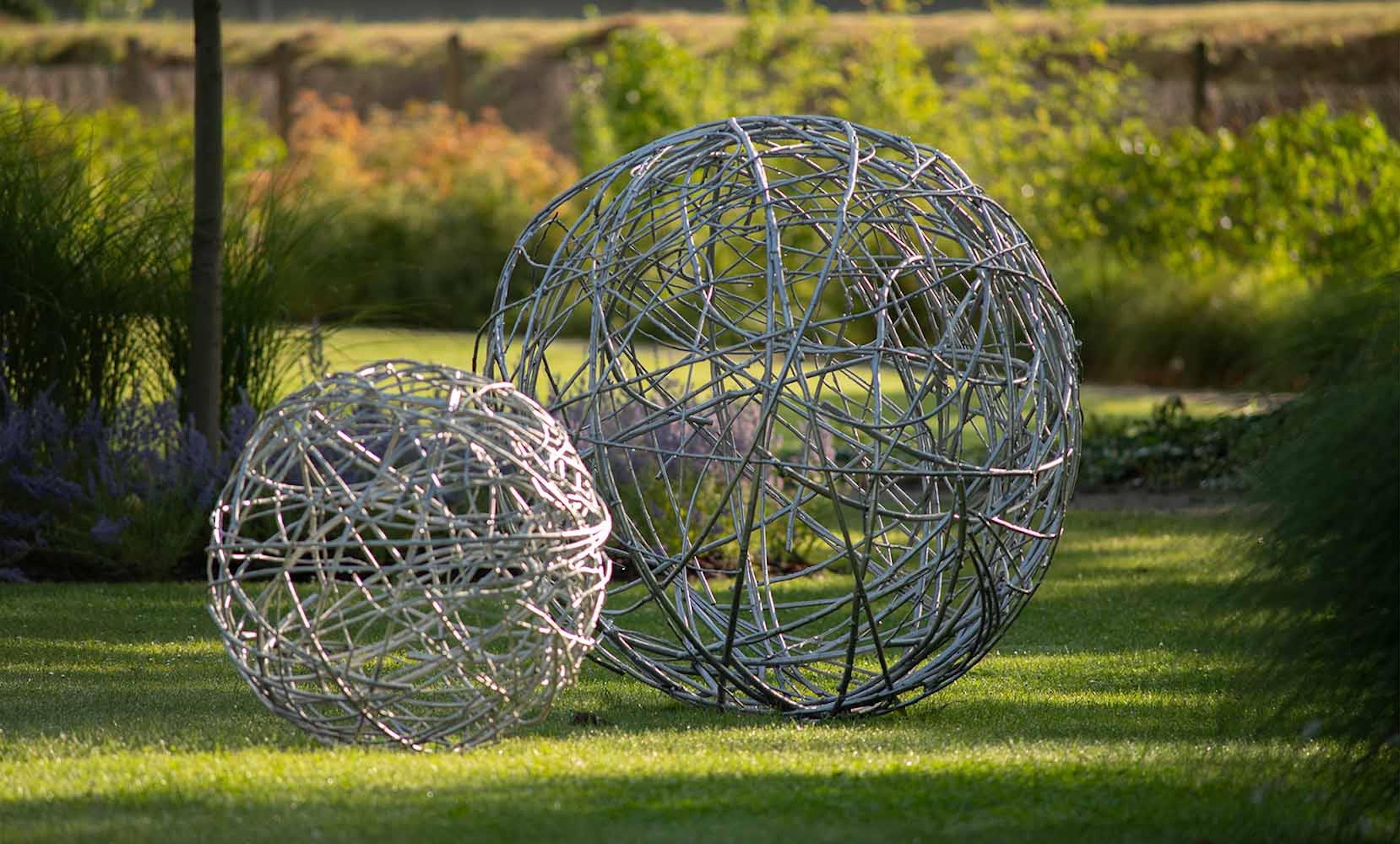 Urbantree I, II & III, by Czech artist Ondřej Oliva. 
Installation of 3 aluminum sculptures of different sizes:
Urbantree I: 150 cm x 150 cm x 150 cm. Edition of 6.
Urbantree II: 90 cm x 90 cm x 90 cm. Edition of 6.
Urbantree III: 80 cm x 80 cm x 80